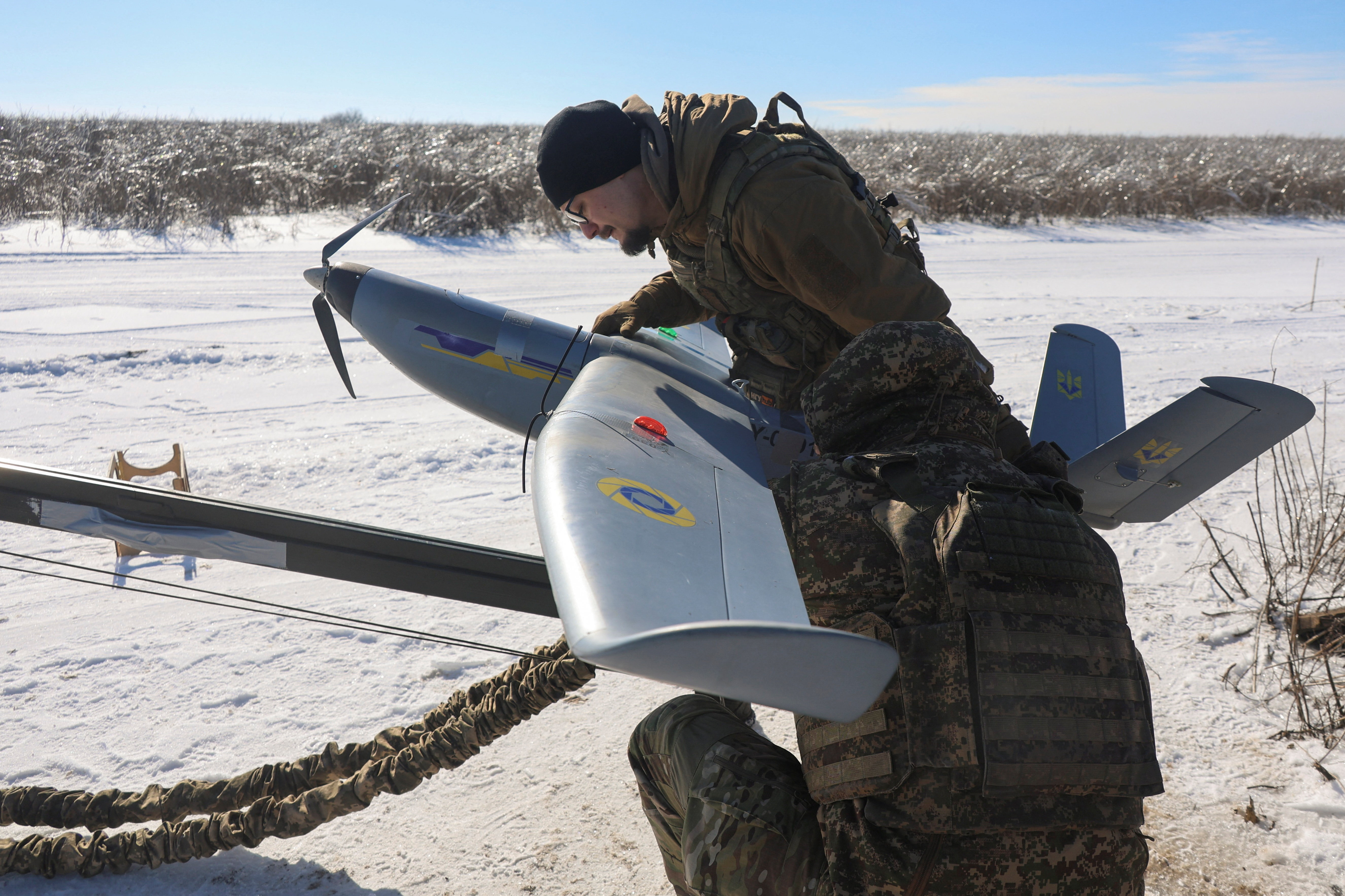 Ukrainian servicemen prepare a reconnaissance drone