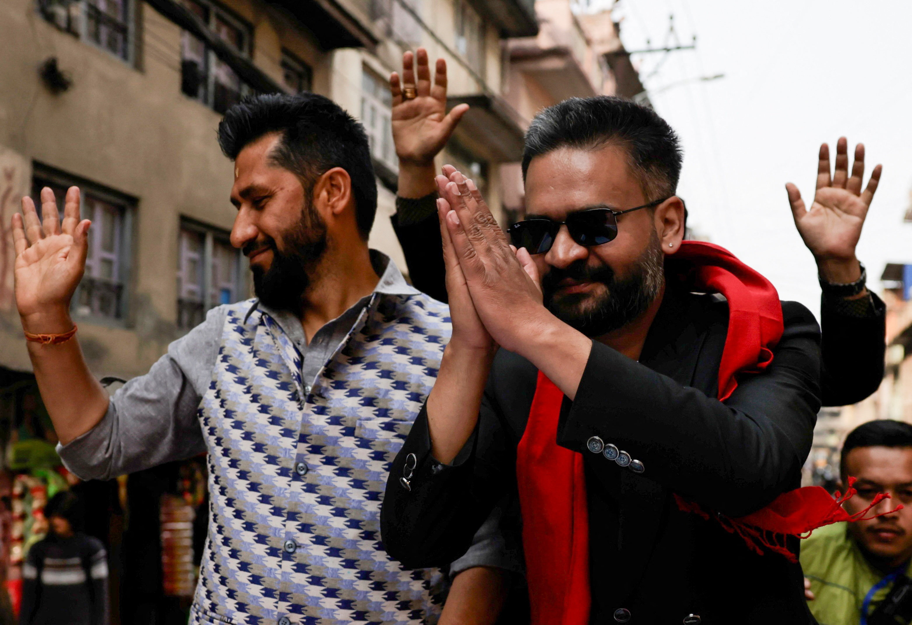 Balendra Shah, a rapper-turned-politician and the prime ministerial candidate for the Rastriya Swatantra Party (RSP), along with Rabi Lamichhane, president of the Rastriya Swatantra Party (RSP), take part in an election campaign in Kirtipur, Kathmandu, Nepal, February 28, 2026. REUTERS/Navesh Chitrakar