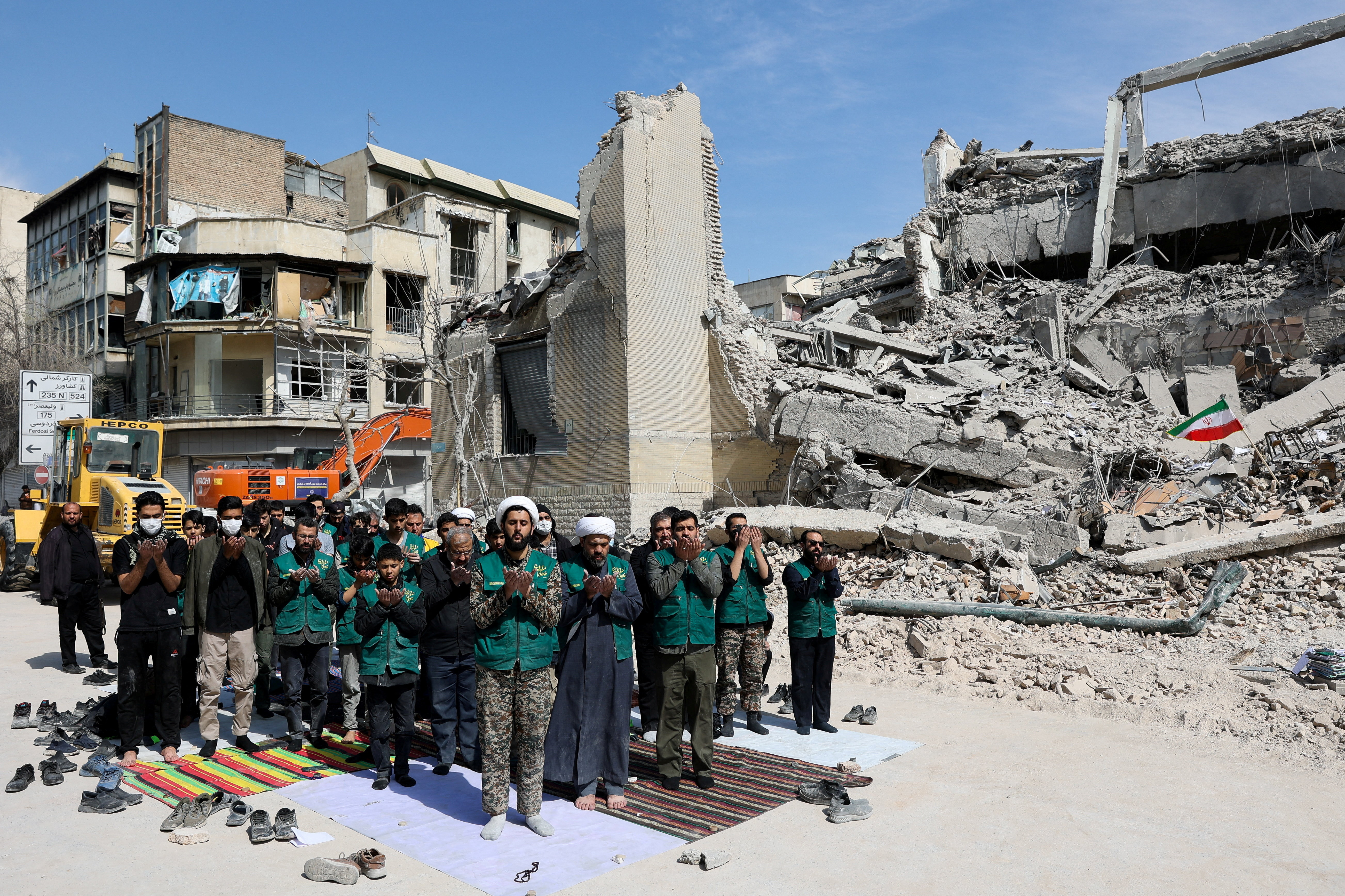 People pray, following a strike on a police station, amid the U.S.-Israeli conflict with Iran, in Tehran, Iran, March 4, 2026.
