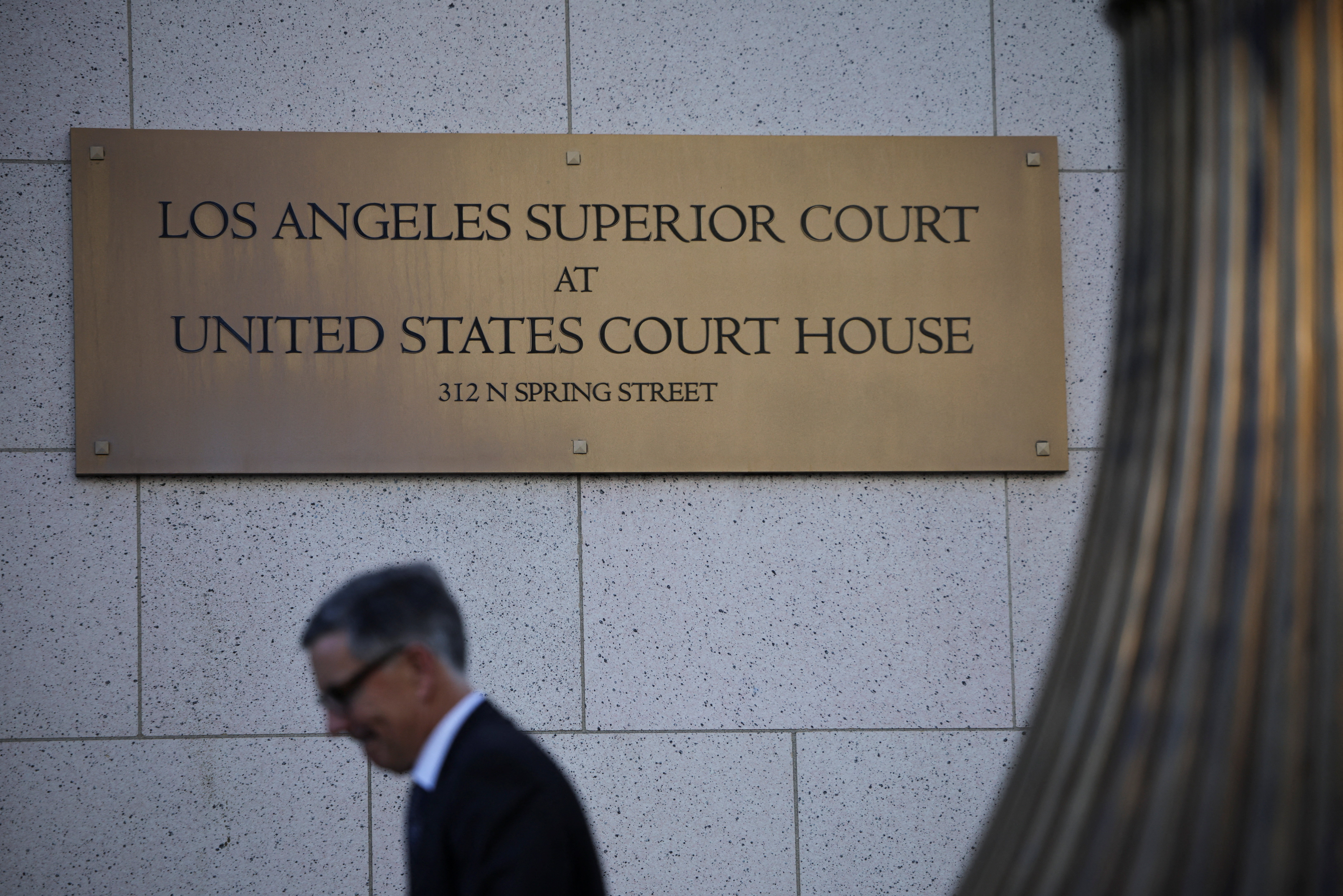 The ruling comes ahead of a comparable federal case slated to begin in June [File: Daniel Cole/Reuters]