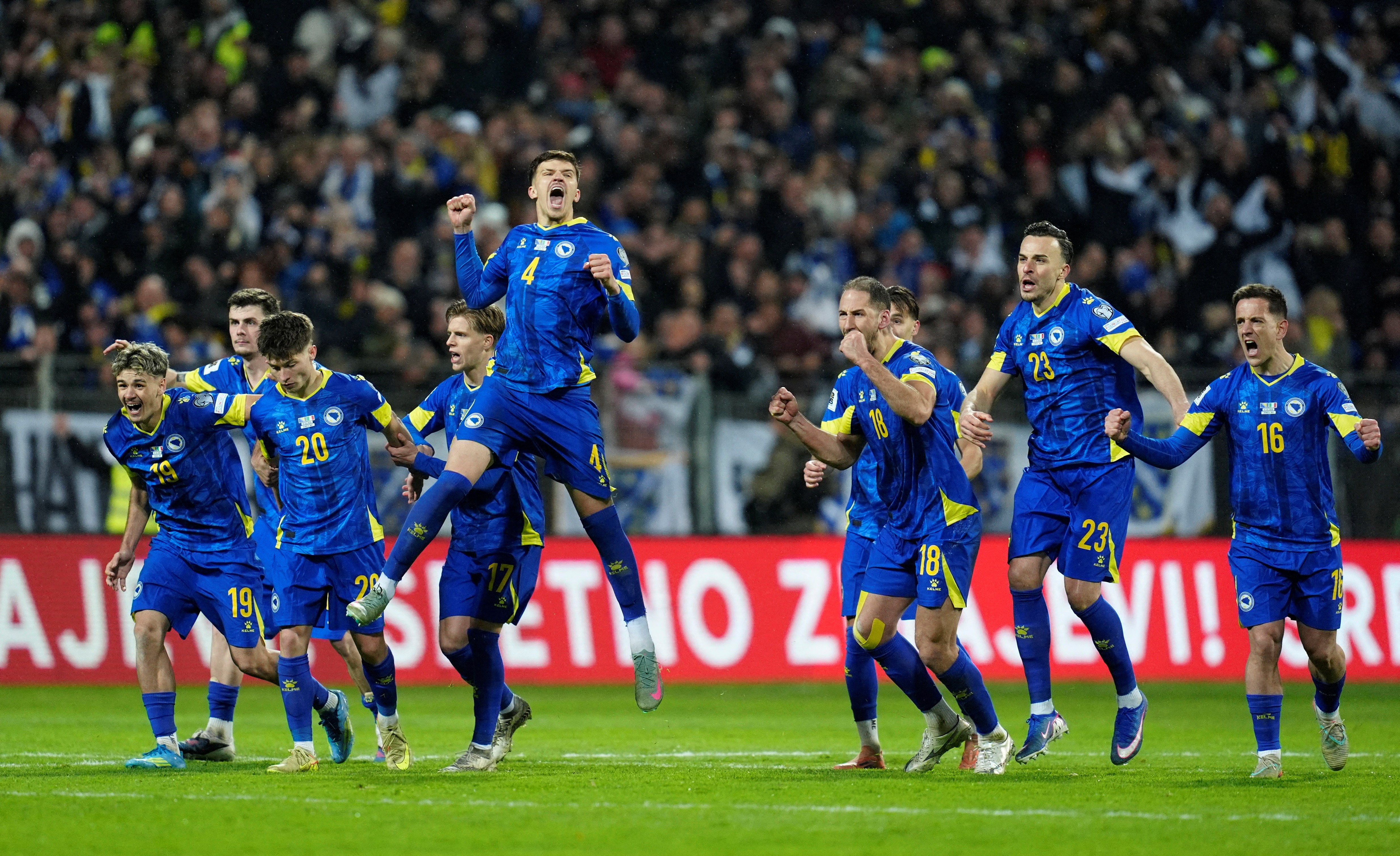 Bosnia and Herzegovina players celebrate during the penalty shootout