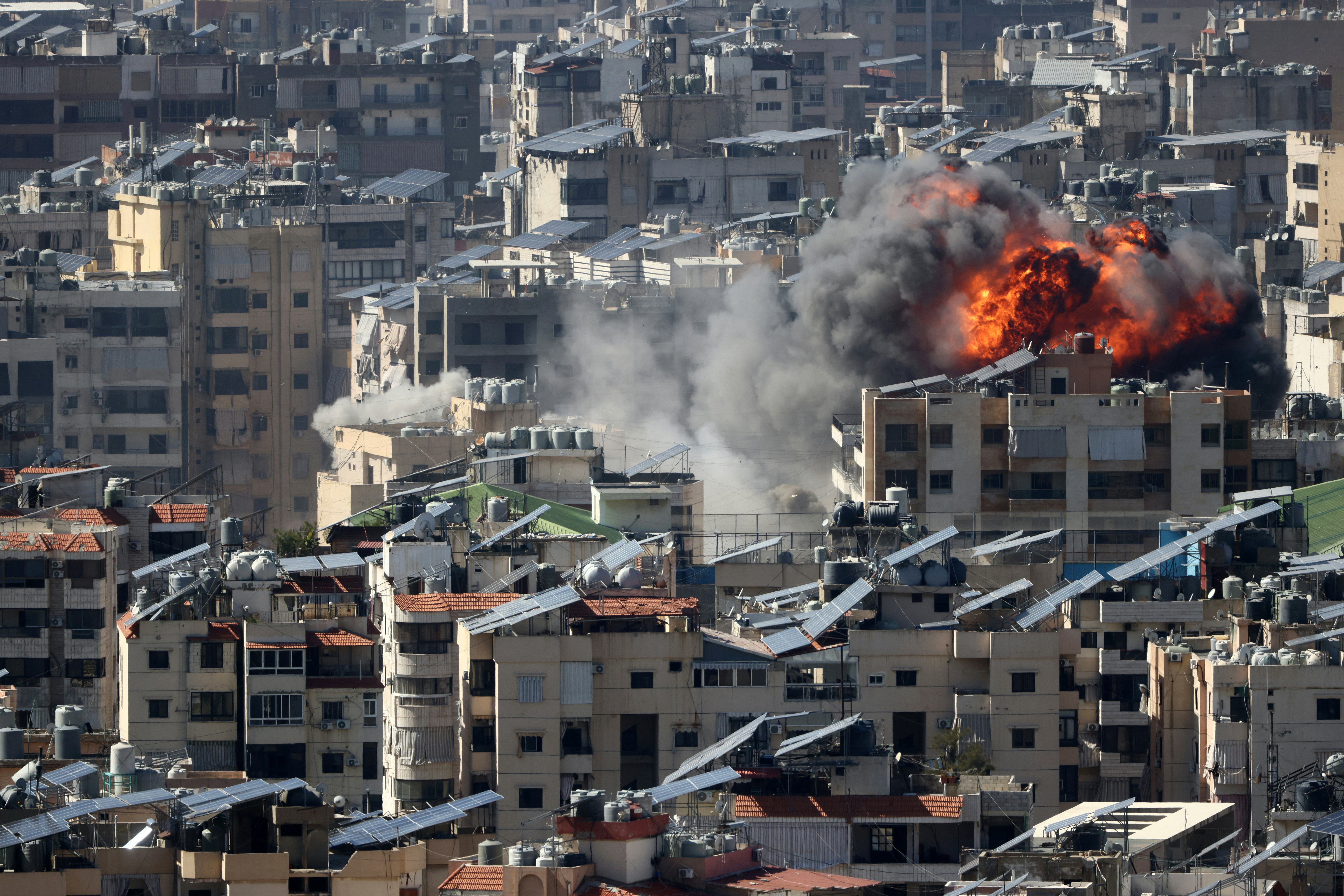 A fireball rises from the site of an Israeli air strike in the southern suburbs of the Lebanese capital Beirut on March 9, 2026. Lebanon was drawn into the Middle East war last week when Iran-backed militant group Hezbollah attacked Israel in response to the killing of Iranian supreme leader Ayatollah Ali Khamenei during US-Israeli strikes. [Ibrahim Amro /AFP)