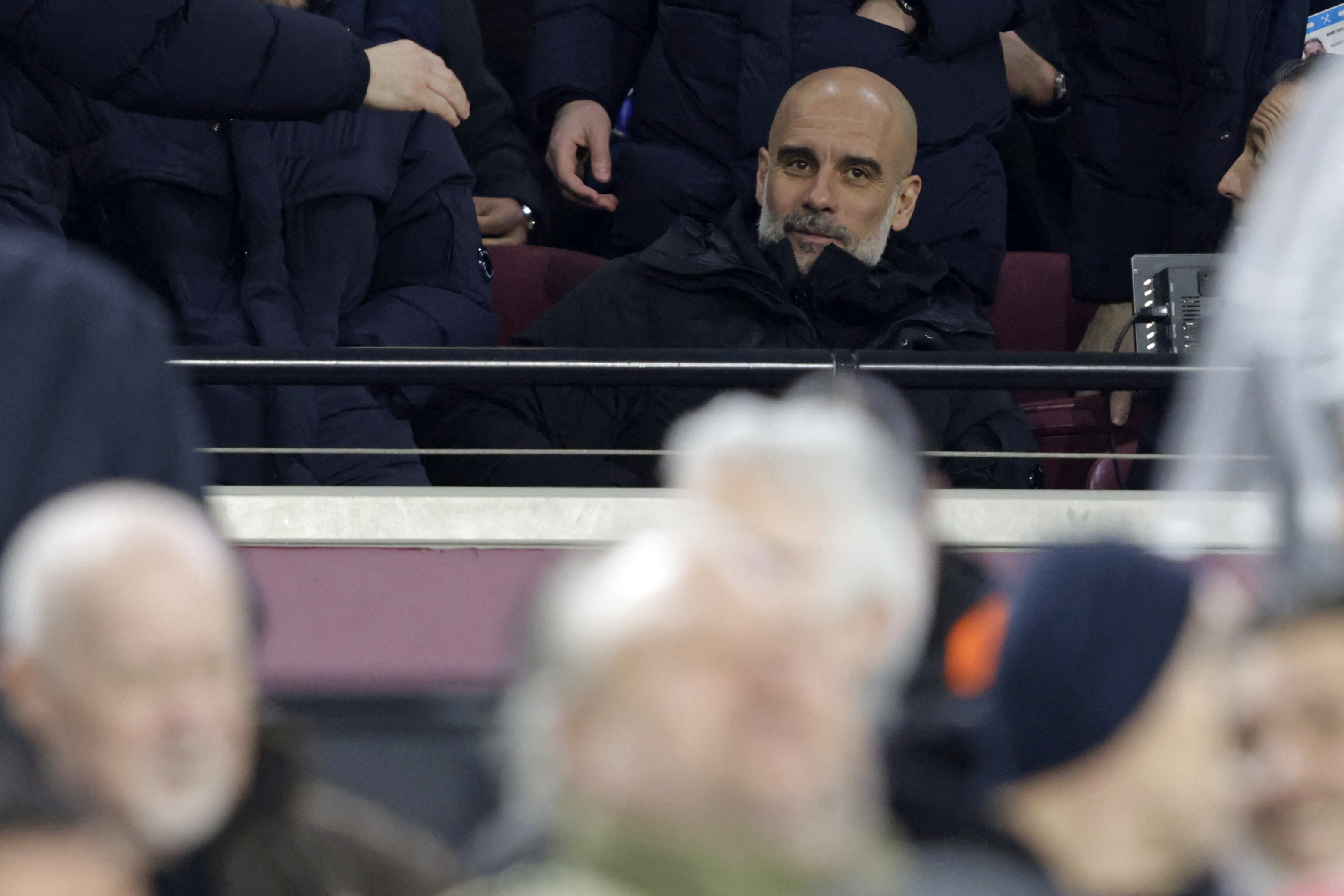 Pep Guardiola reacts.