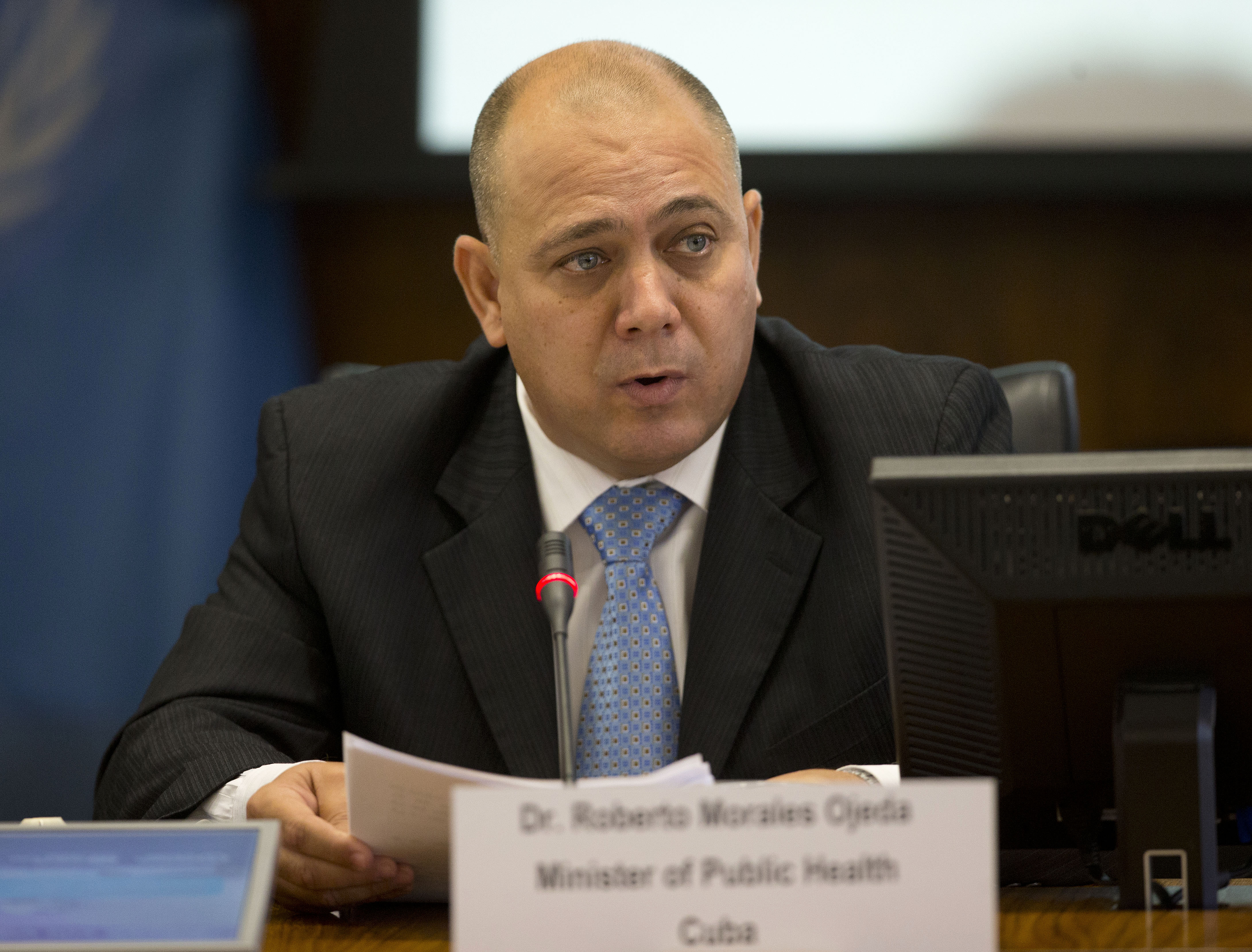 Cuba's Health Minister Dr. Roberto Tomas Morales Ojeda speaks at the World Health Organization (WHO) to announce that Cuba is world's first country to receive validation of having eliminated mother-to-child transmission of HIV and Syphilis, Tuesday, June 30, 2015, at Pan American Health Organization/World Health Organization (PAHO/WHO) headquarters in Washington. (AP Photo/Pablo Martinez Monsivais)