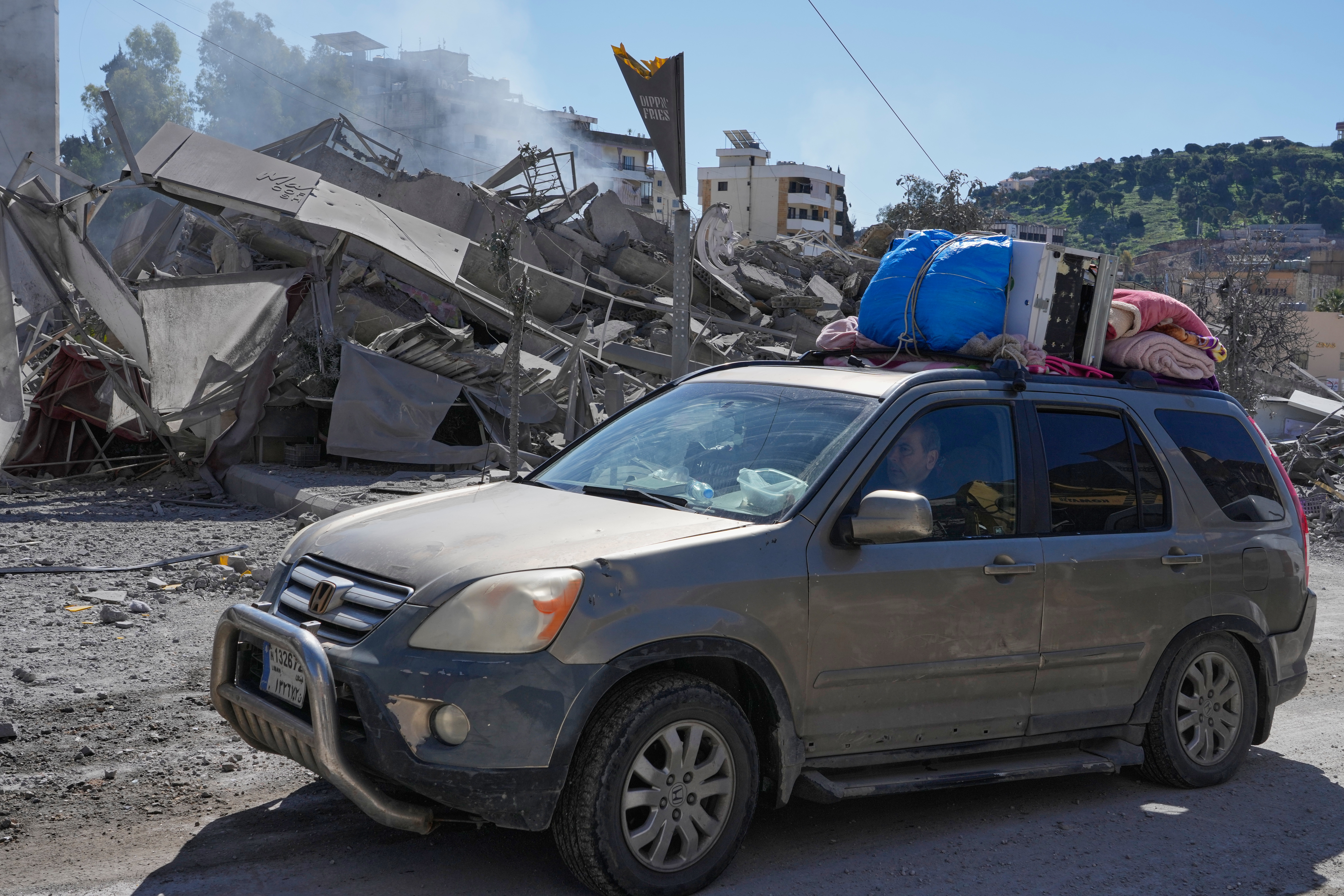 Buildings devastated by Israeli strikes in Lebanon, death toll rises to 77