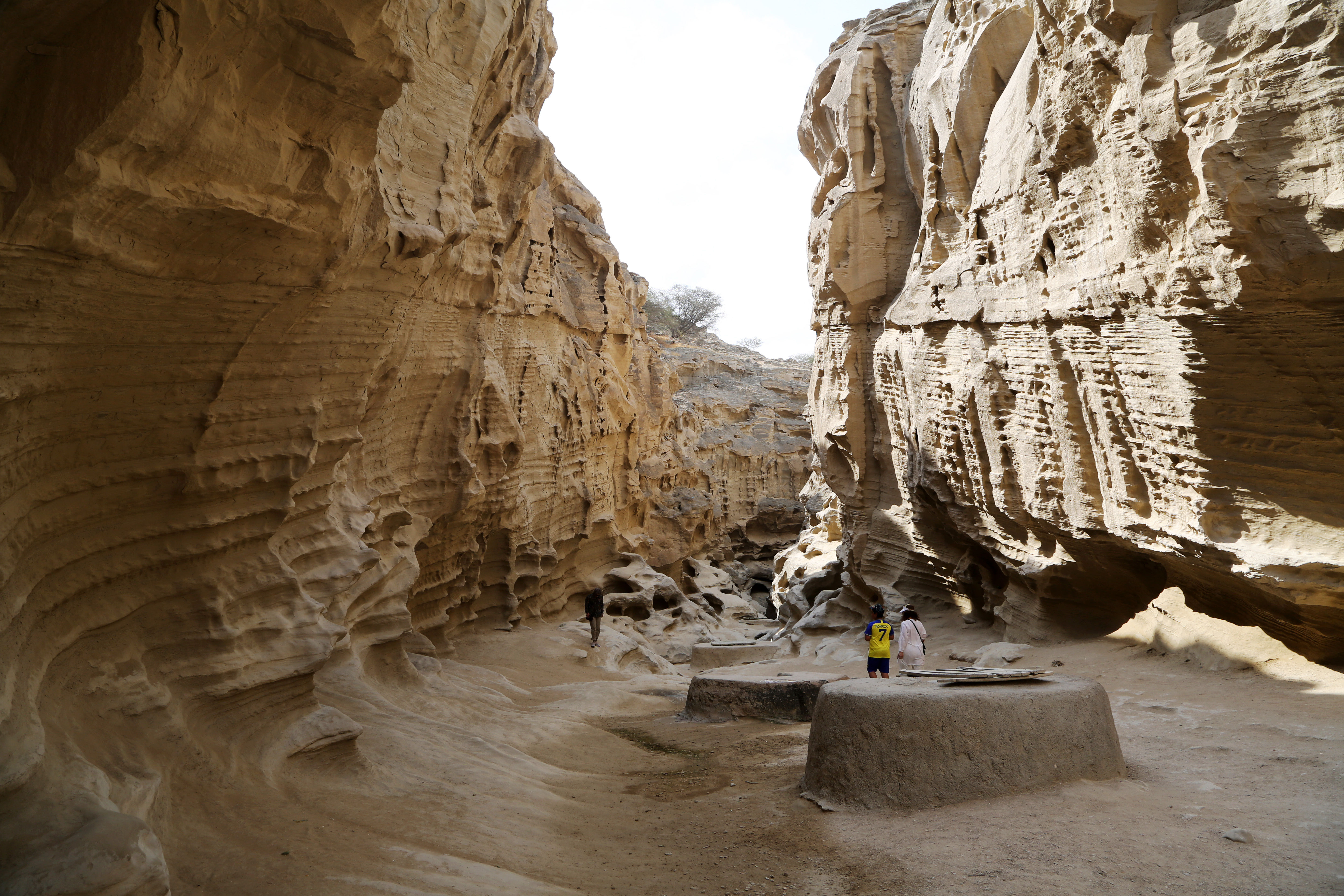 HORMOZGAN, IRAN - APRIL 16: A view of Chahkooh canyon, which attracts domestic and foreign tourists, located on Qeshm Island in Hormozgan province, Iran on April 16, 2023. The canyon, which forms a part of Qeshm Geopark, which is on the UNESCO World list, fascinates those visiting with its scenery. The 100-meter-deep canyon, which is formed by the erosion of sedimentary rocks, is visited by thousands of tourists every year. (Photo by Fatemeh Bahrami/Anadolu Agency via Getty Images)