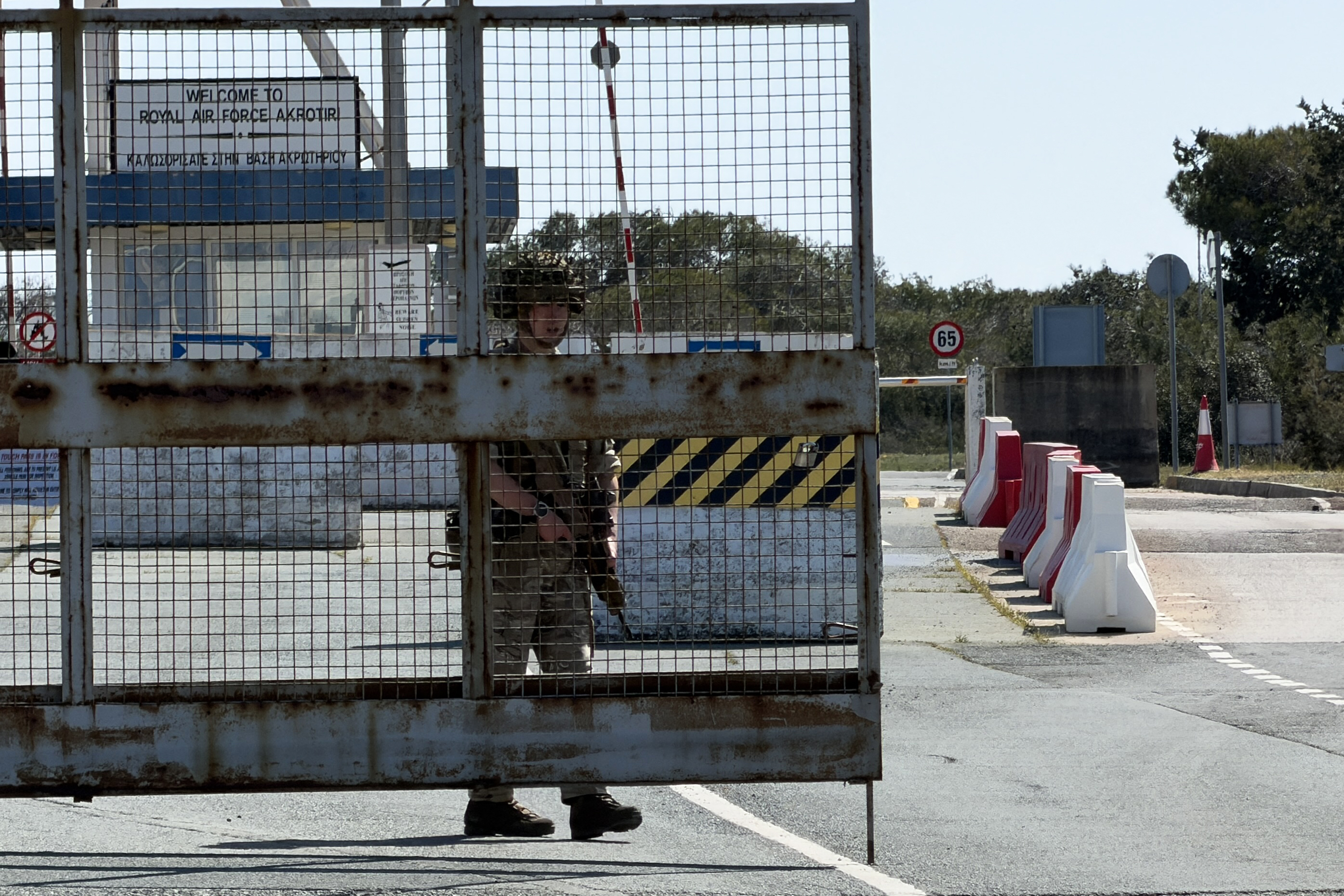 A British soldier mans a gate at RAF Akrotiri base following two reported drone attacks near Limassol on March 2, 2026.