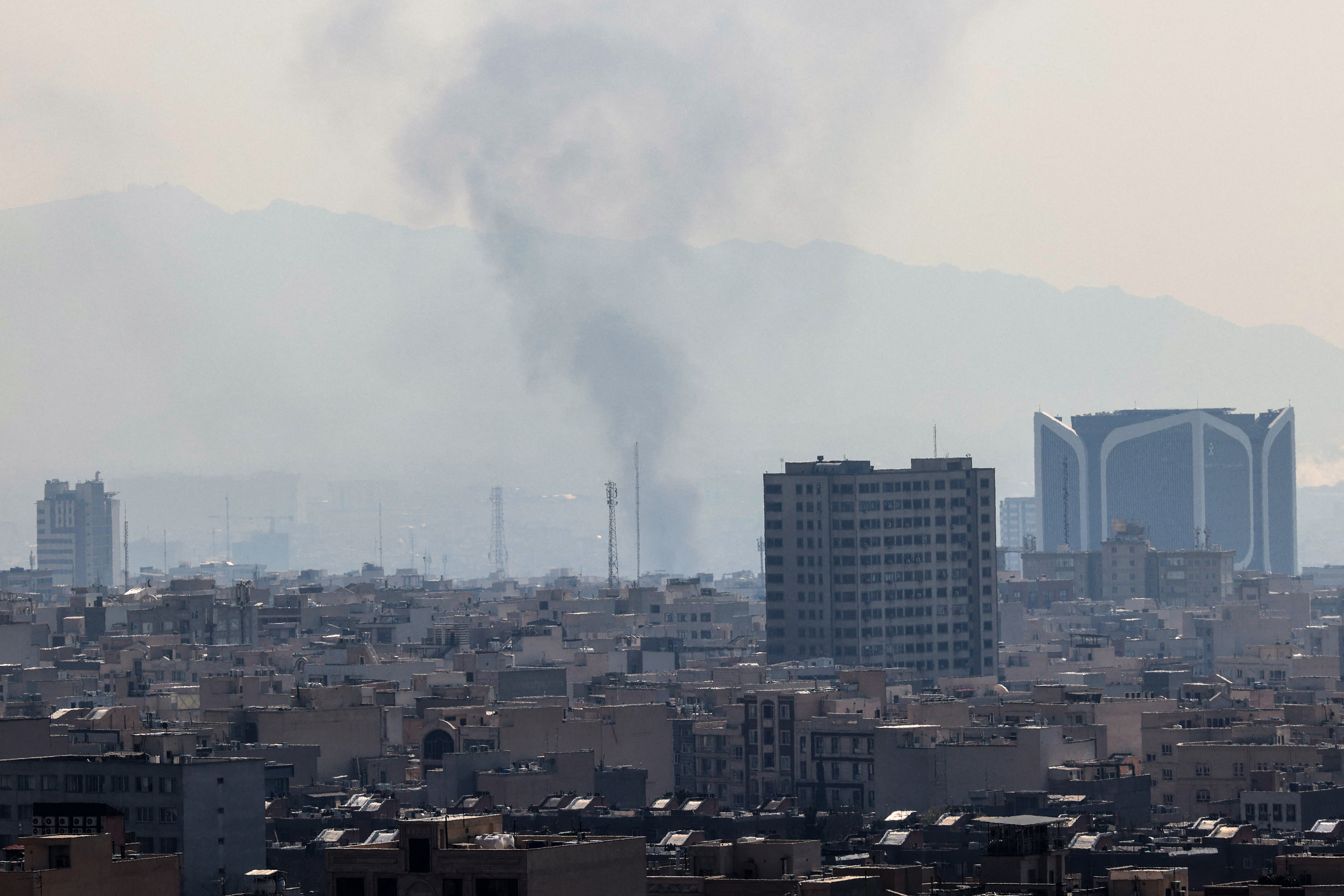 Smoke rises from the site of airstrikes in a central area of the Iranian capital Tehran on March 6, 2026.