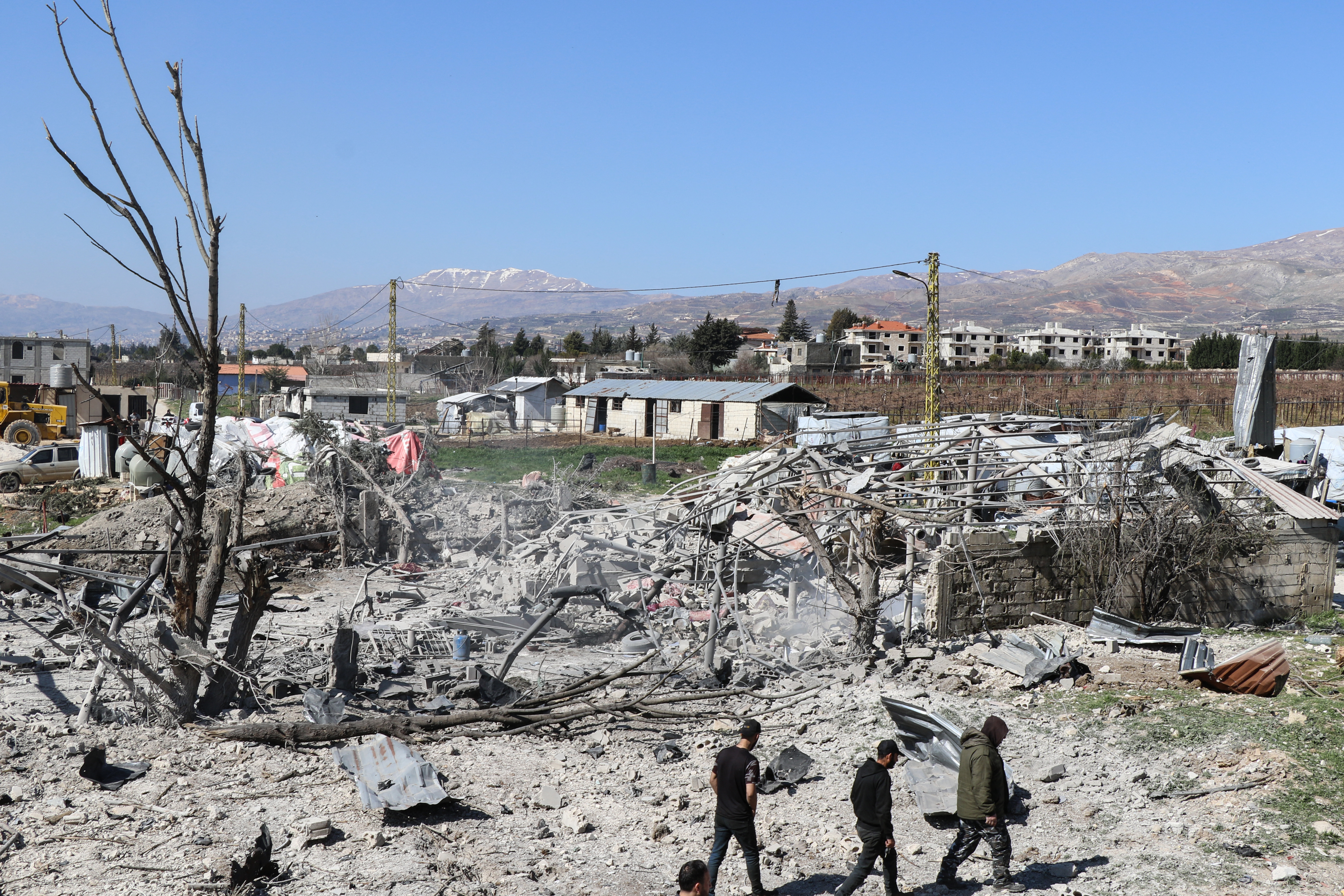 A photograph shows the aftermath of an Israeli airstrike that targeted the village of Temnin in Lebanon's Bekaa Valley on March 11, 2026.