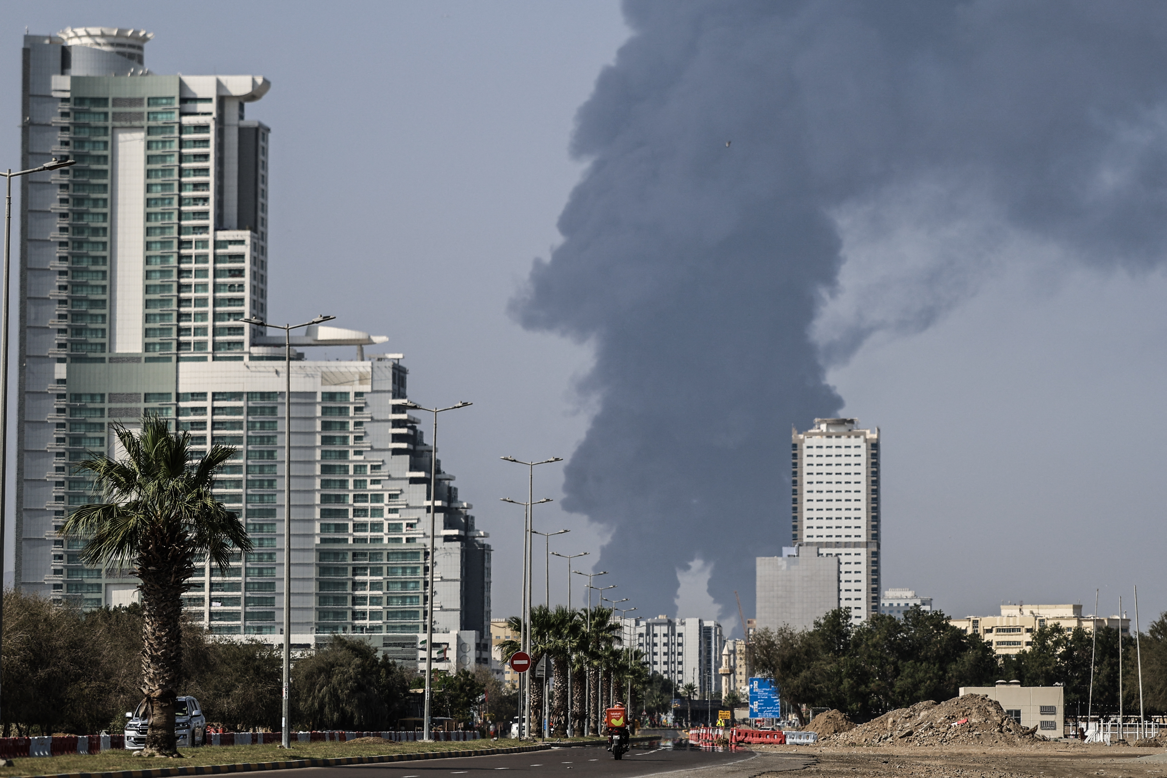 Smoke rises from the direction of an energy installation in the Gulf emirate of Fujairah on March 14, 2026.
