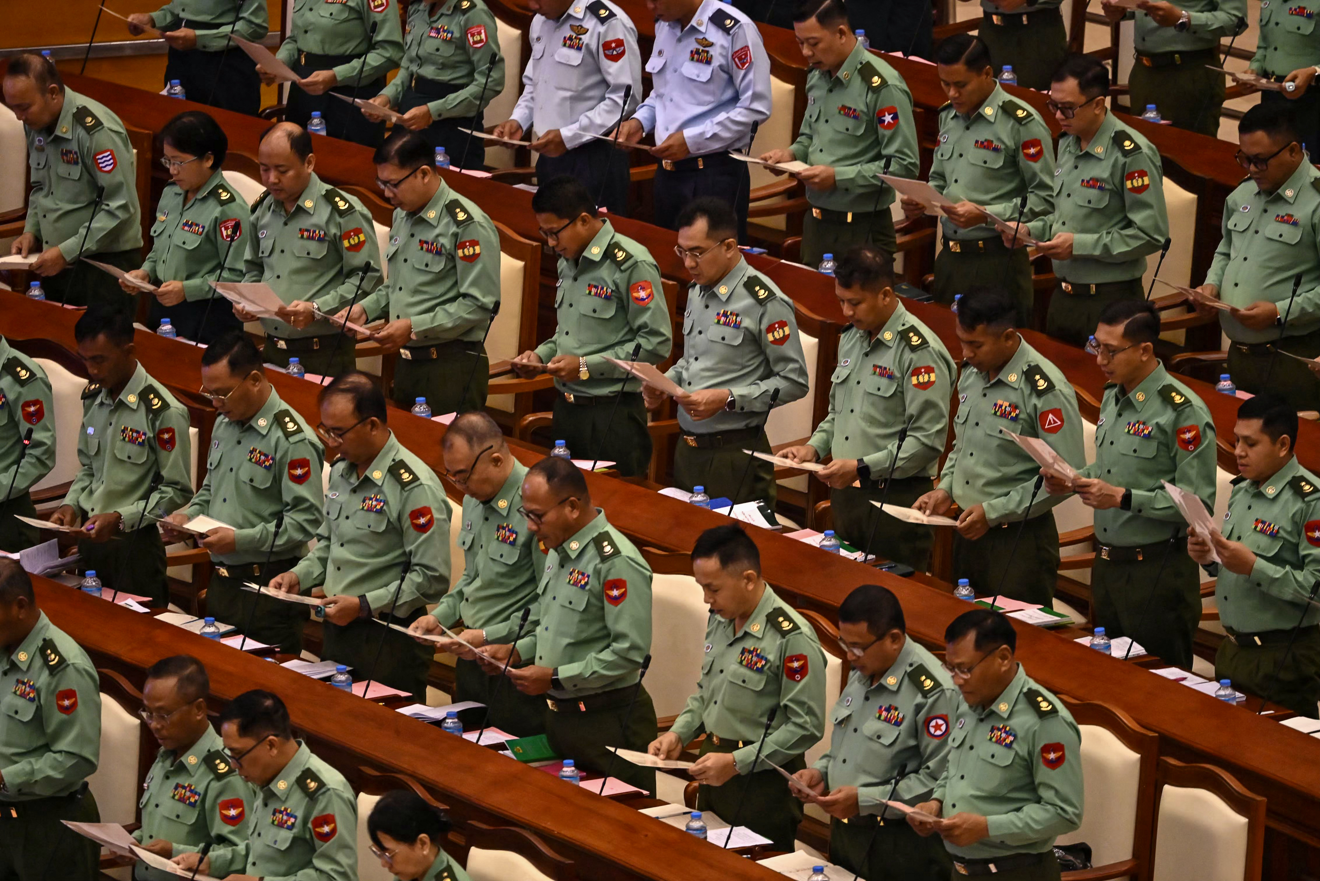 Military officers who serve as members of Myanmar's parliament attend a session of the third term of the Pyithu Hluttaw (House of Representatives) in Naypyidaw on March 16, 2026.