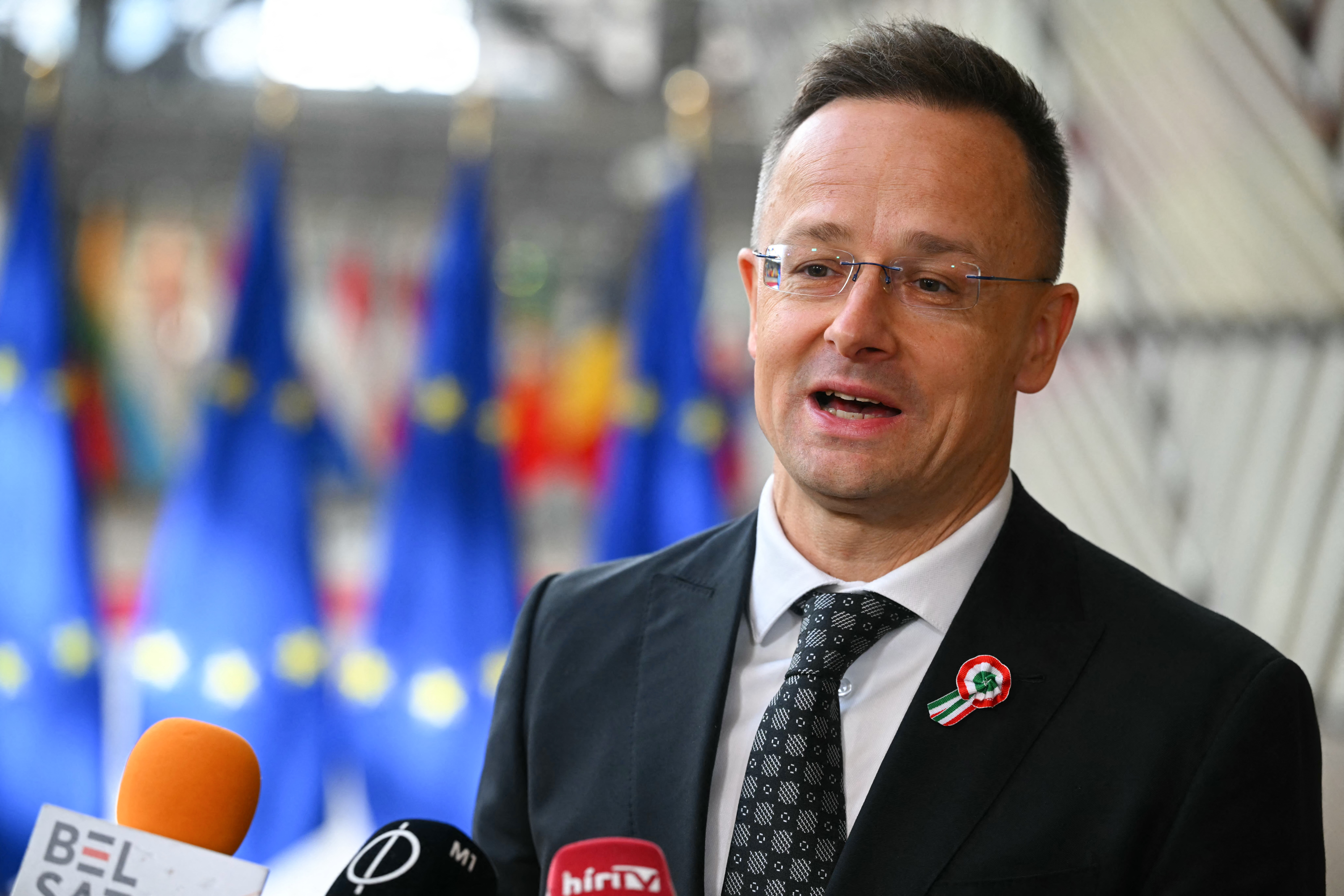 Hungary's Foreign Minister Peter Szijjarto speaks to the media as he arrives for a Foreign Affairs Council to discuss Russia’s war of aggression against Ukraine and the situation in the Middle East, in Brussels on March 16, 2026. (Photo by NICOLAS TUCAT / AFP)