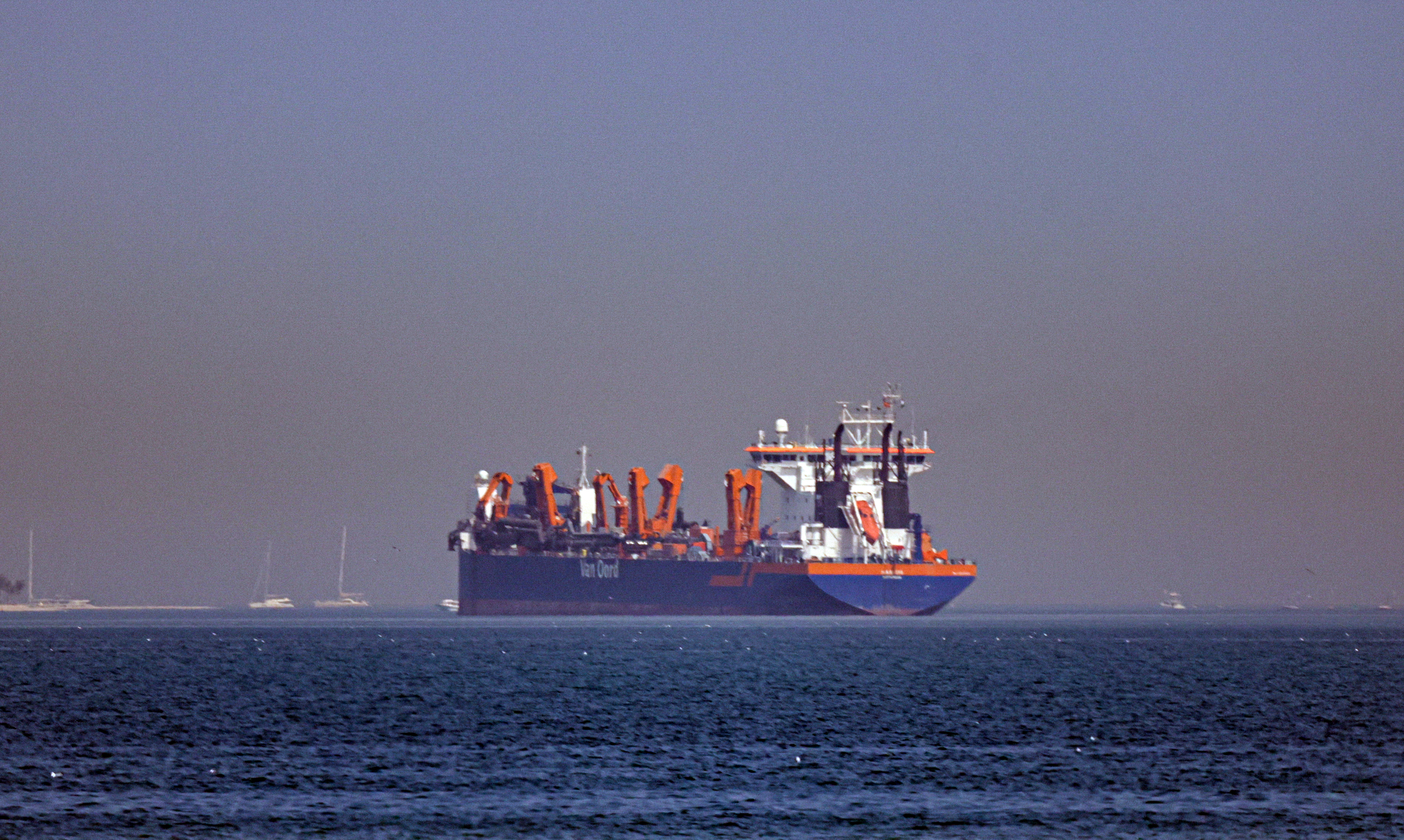 epa12787005 A vessel is seen anchoring off the coast of Dubai, United Arab Emirates, 01 March 2026. Following a joint Israel-US military operation targeting multiple locations across Iran in the early hours of 28 February 2026 and Iran's retaliatory attacks across the region, many ships are anchored as Iran threatened to close the Strait of Hormuz, where hundreds of ships carrying oil pass daily, potentially affecting worldwide trade. EPA/STRINGER