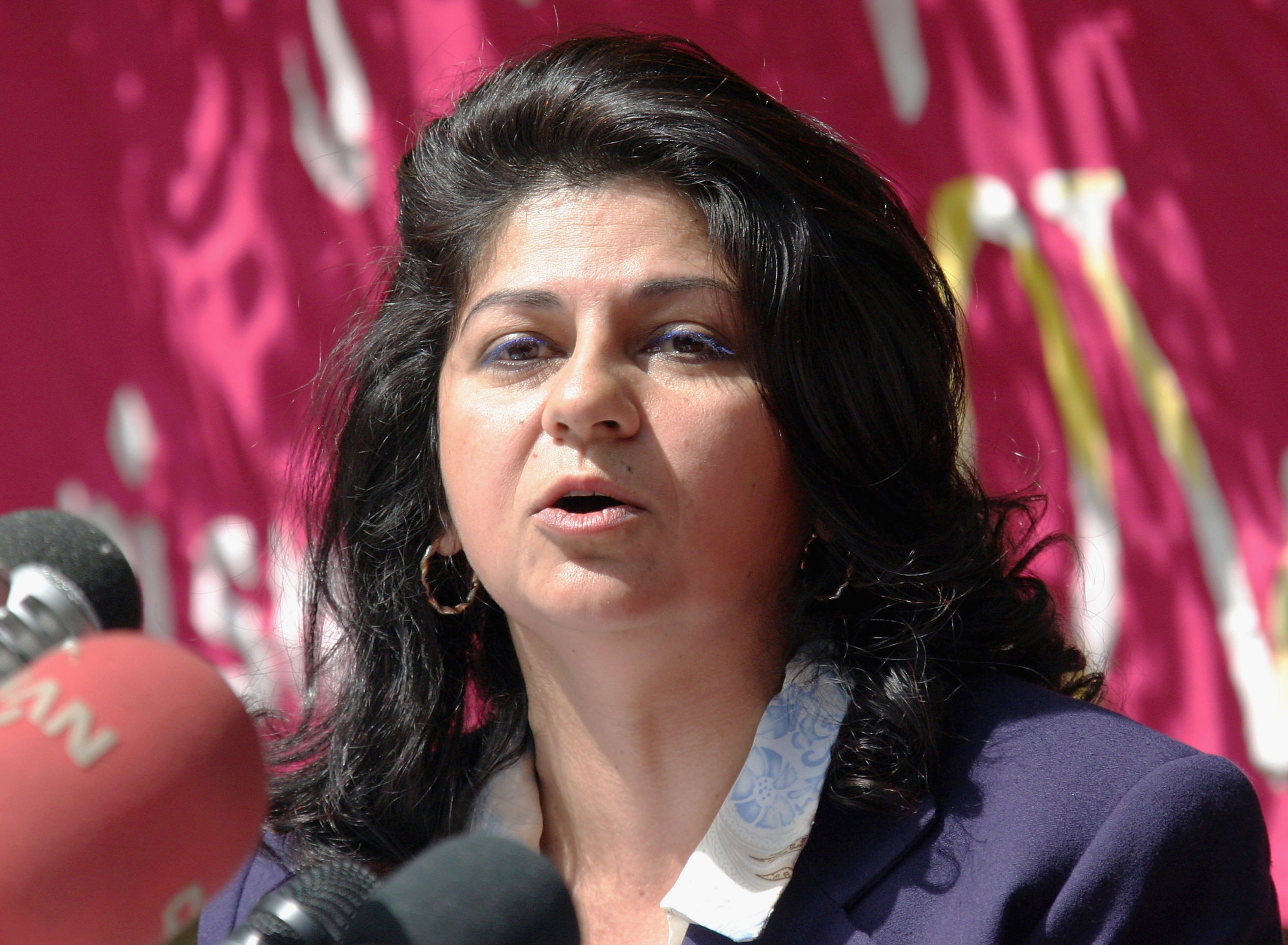BAGHDAD, IRAQ - MARCH 8 : Iraqi activist Yanar Mohammed, head of the Women's Freedom in Iraq Organization, speaks on March 8, 2006 during a celebration for the Women's day in Baghdad, Iraq. Yanar Mohammed said that occupation forces, Islamic laws and barbaric traditions govern the Iraqi society. (Photo by Akram Saleh /Getty Images).