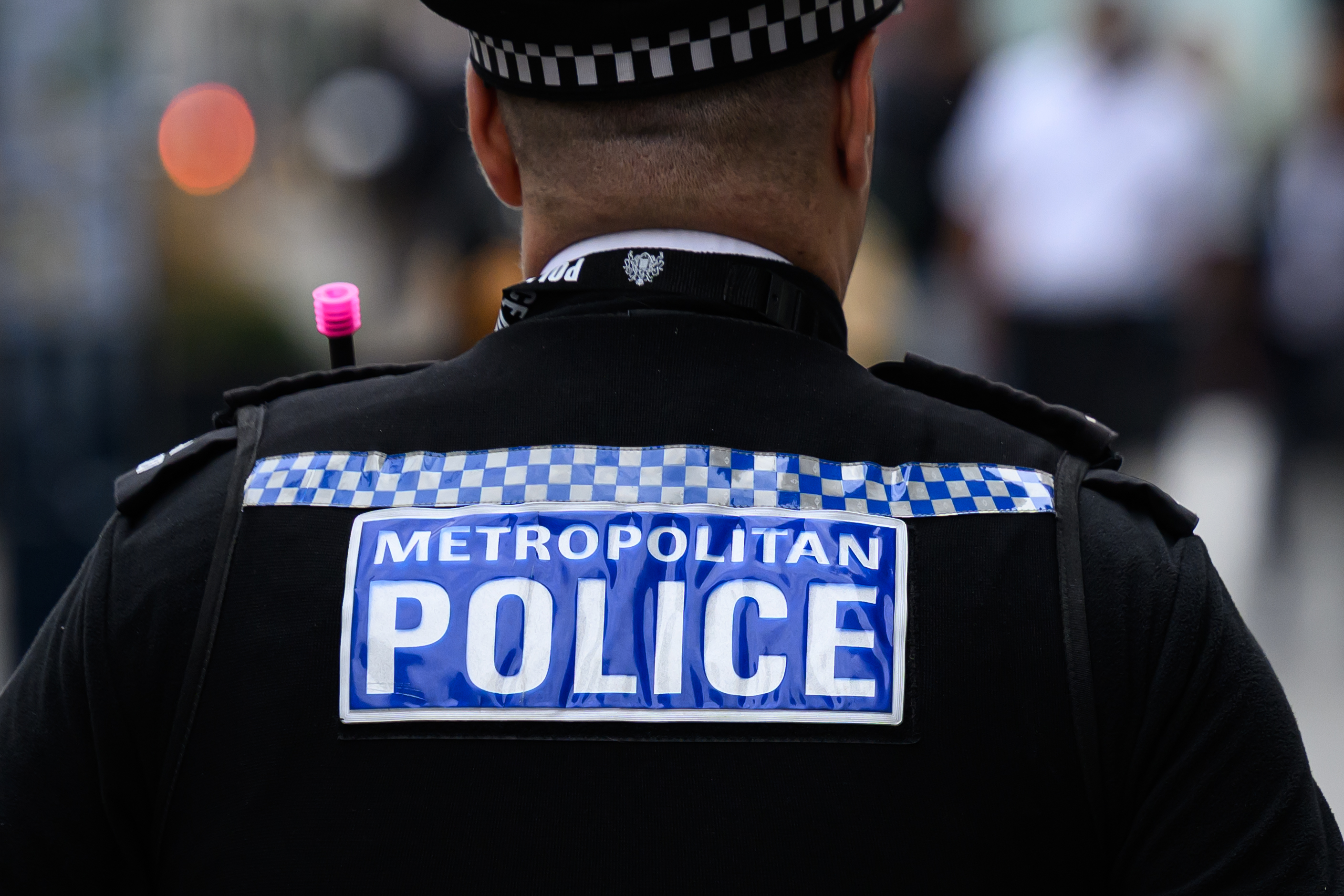 LONDON, ENGLAND - OCTOBER 02: A member of the Metropolitan Police patrols the Oxford Street retail district on October 02, 2025 in London, England. This week's BBC Panorama programme exposed what the Metropolitan Police commissioner described in a statement as "appalling, potentially criminal, behaviour," leading to the suspension of nine officers and one staff member. (Photo by Leon Neal/Getty Images)