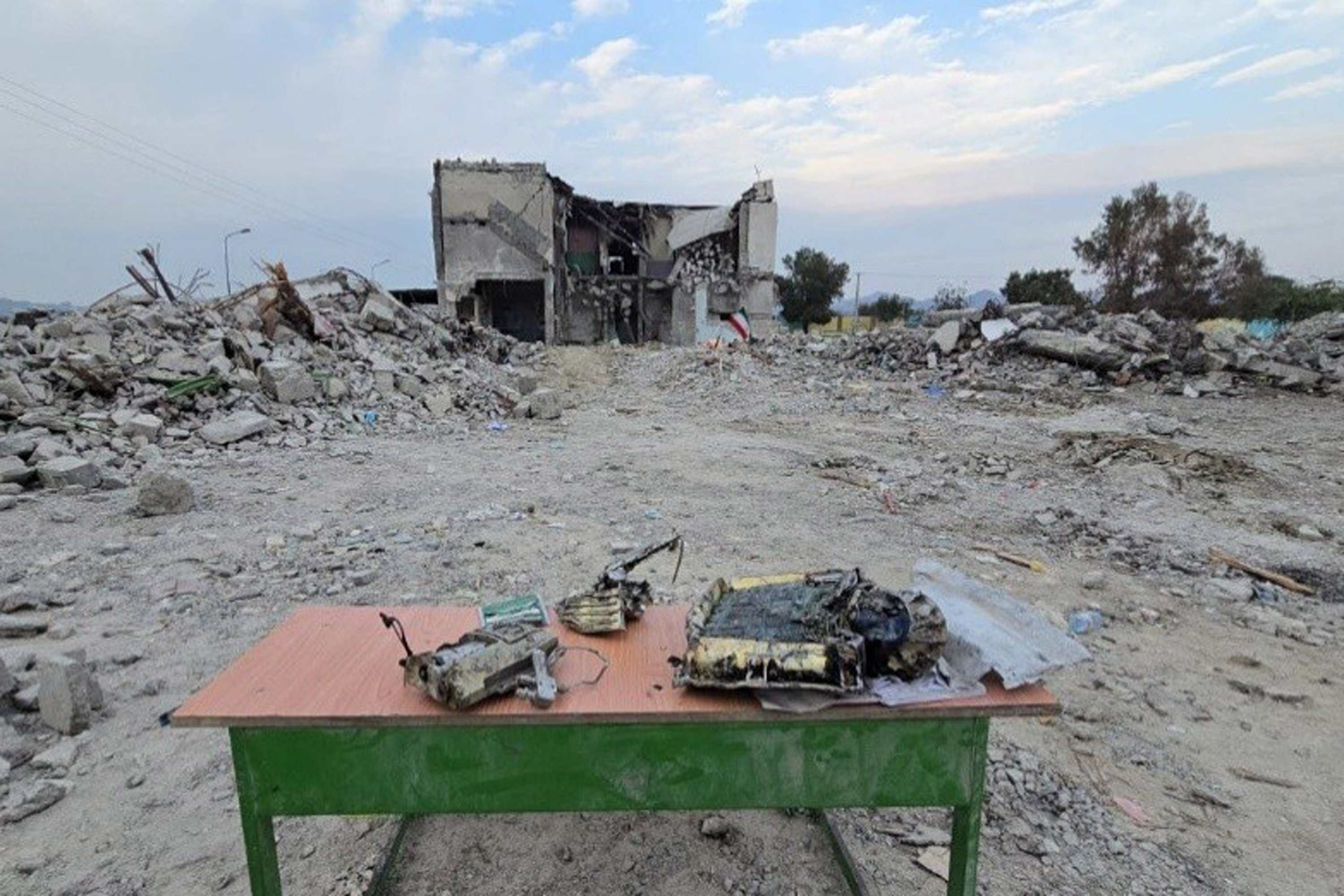 Fragments of a missile displayed on a table in Manib, Iran [Courtesy of Ali Bahreini]