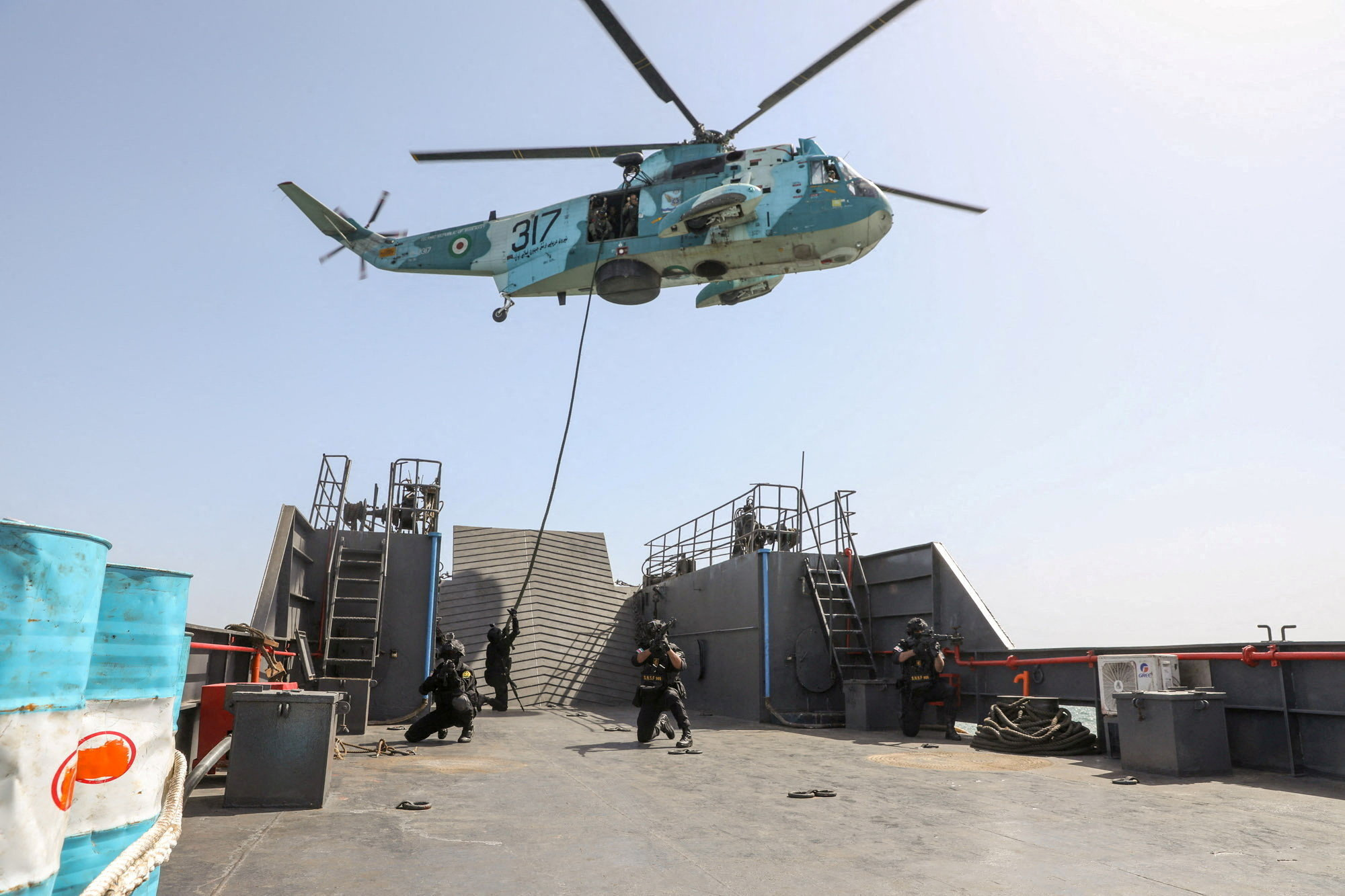 Members of the Iranian Army attend the joint Navy exercise of Iran and Russia in southern Iran, in this handout image obtained on February 19, 2026. Iranian Army/WANA (West Asia News Agency)/Handout via REUTERS ATTENTION EDITORS - THIS PICTURE WAS PROVIDED BY A THIRD PARTY. TPX IMAGES OF THE DAY
