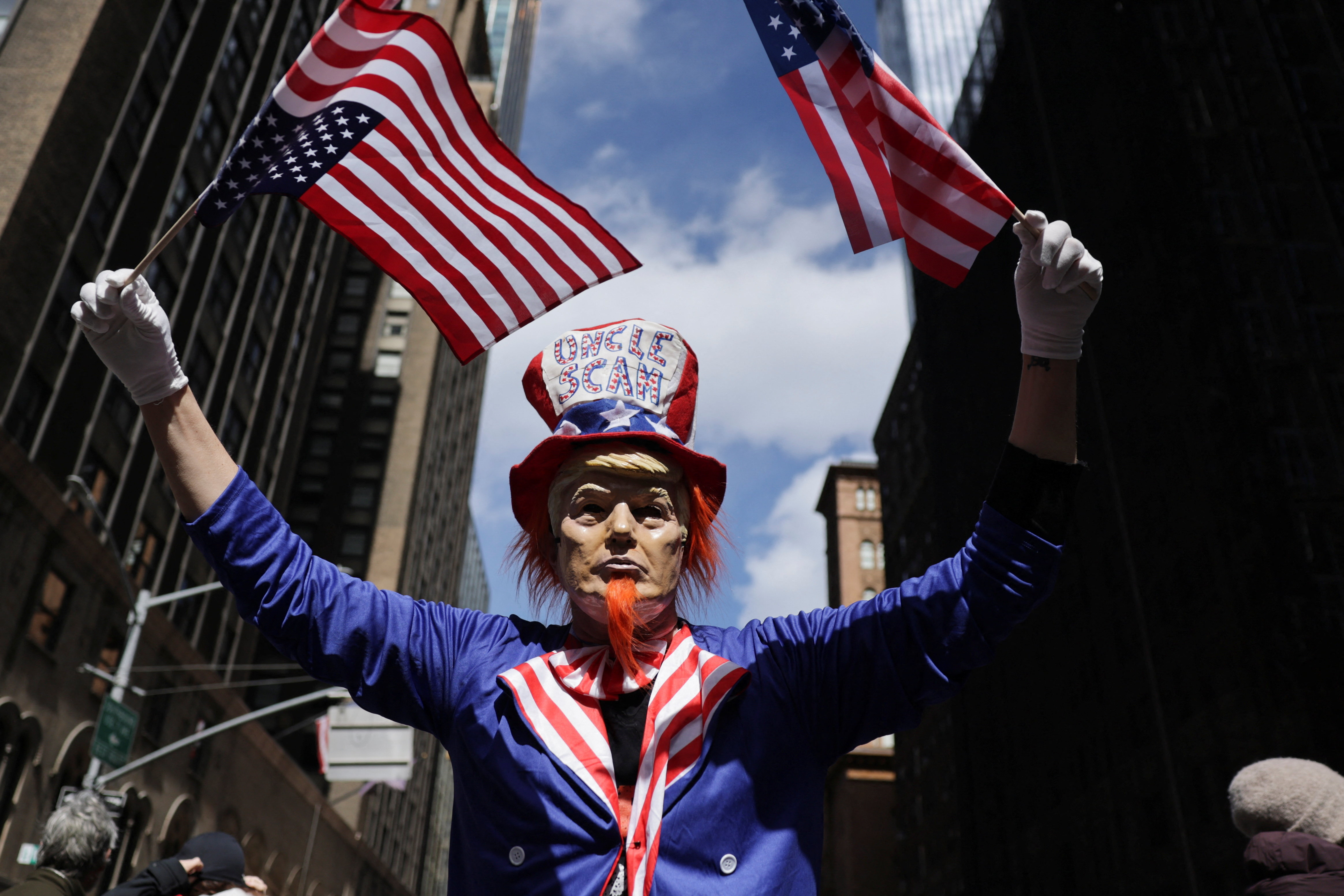 A dressed-up demonstrator, with the words "Uncle Scam" on their costume, on the day of "No Kings" protest against U.S. President Donald Trump's administration policies, in New York City, New York, U.S., March 28, 2026. REUTERS/Jeenah Moon