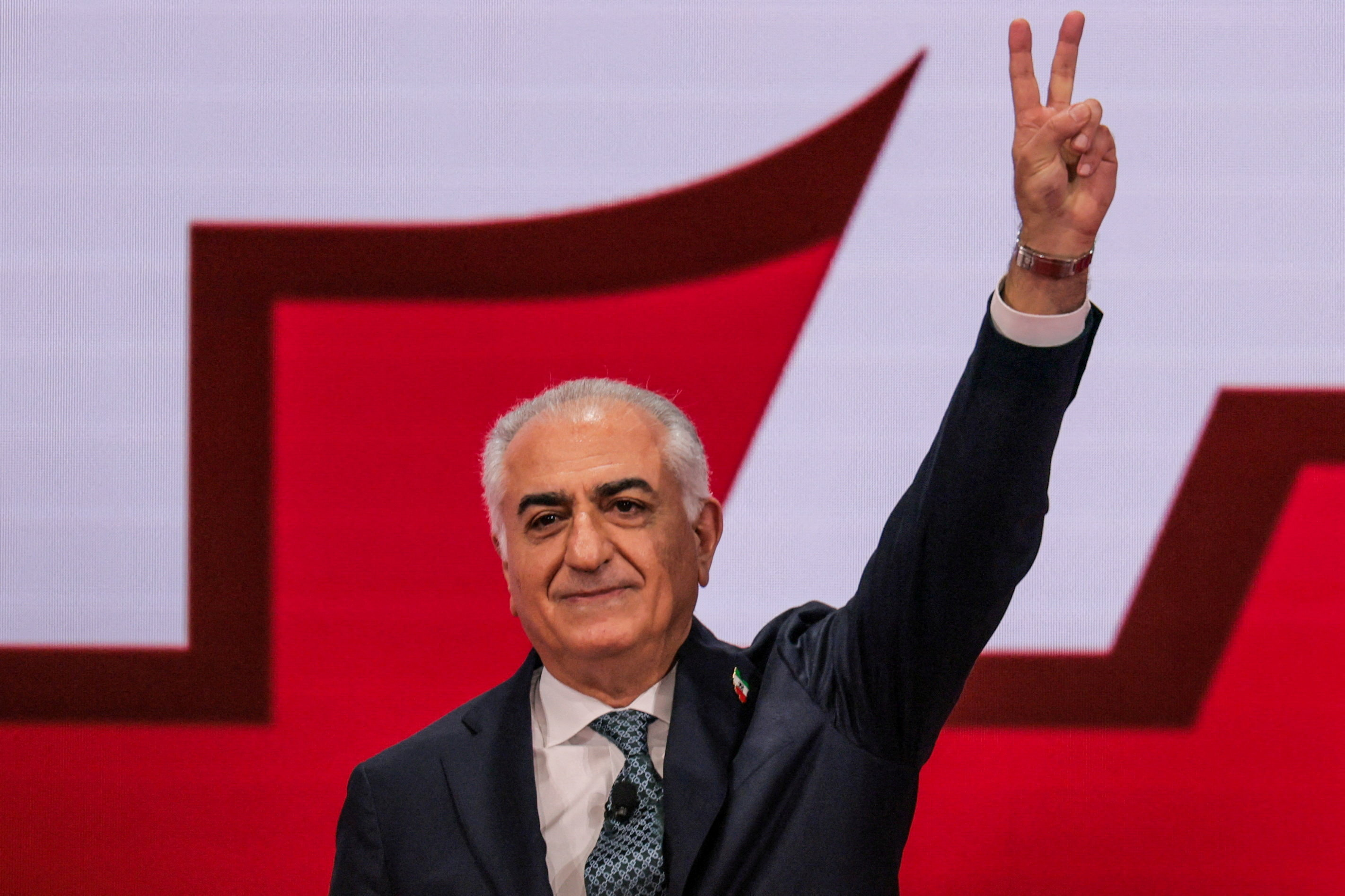 Reza Pahlavi, the exiled son of Iran's last shah and an Iranian opposition figure flashes the victory sign during the Conservative Political Action Conference (CPAC) USA 2026 at the Gaylord Texan Resort and Convention Center, in Grapevine, Texas, U.S., March 28, 2026. REUTERS/Daniel Cole TPX IMAGES OF THE DAY