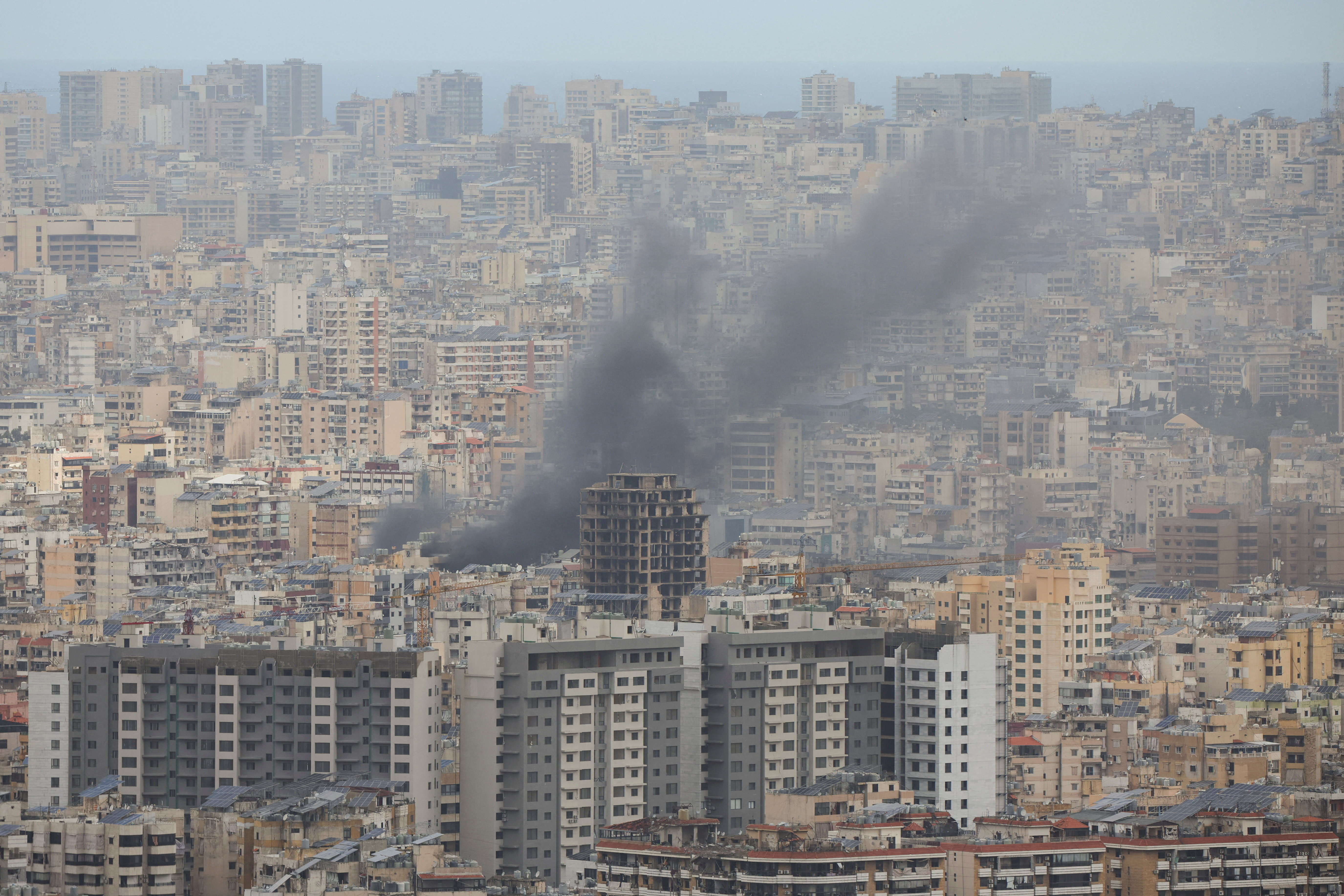 Smoke rises from Beirut's southern suburbs following an Israeli strike, amid escalating hostilities between Israel and Hezbollah, as the U.S.-Israel conflict with Iran continues, Lebanon, March 30, 2026. REUTERS/Adnan Abidi TPX IMAGES OF THE DAY