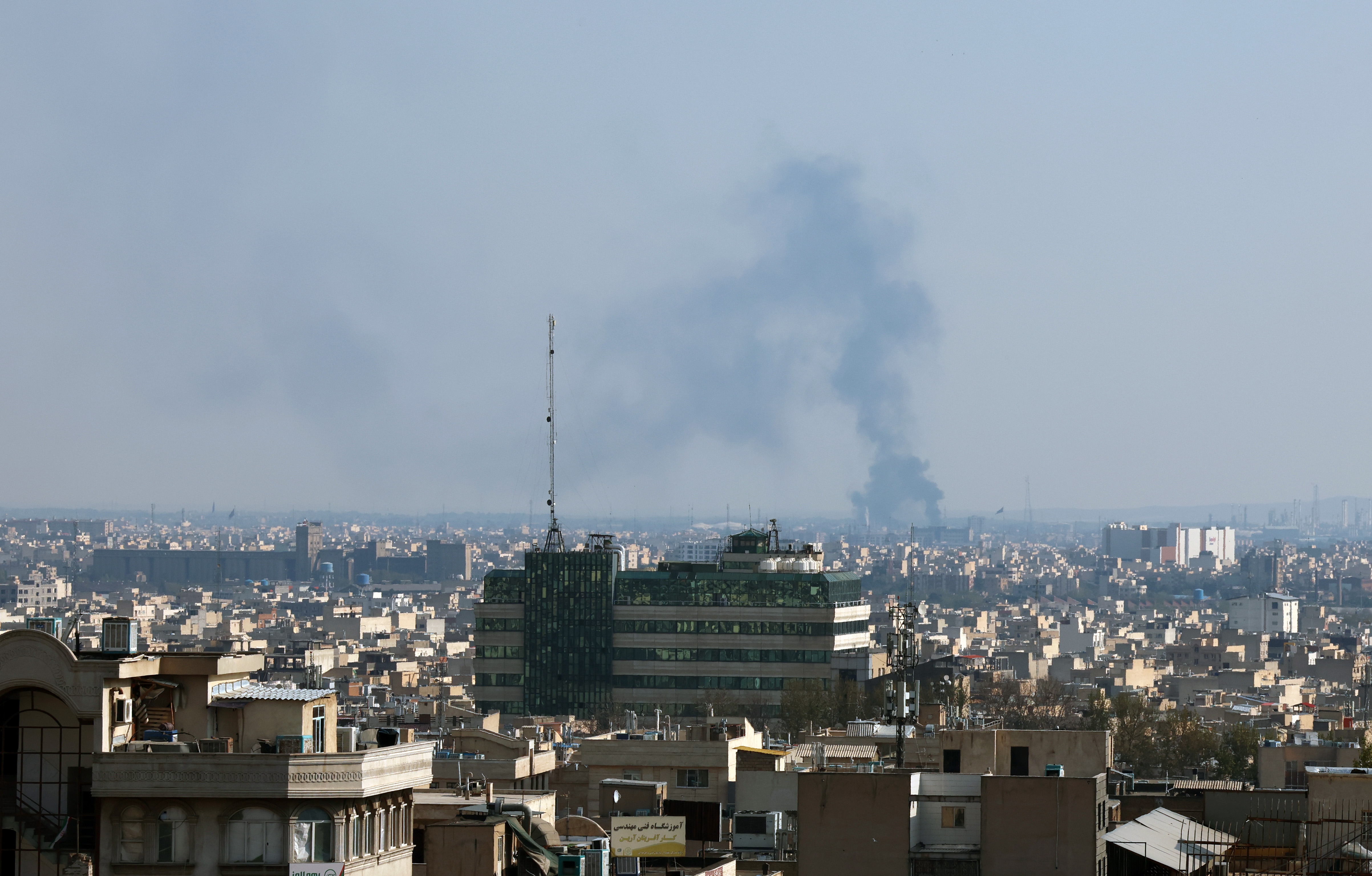 Smoke rises after an airstrike in central Tehran, Iran on April 1, 2026. 