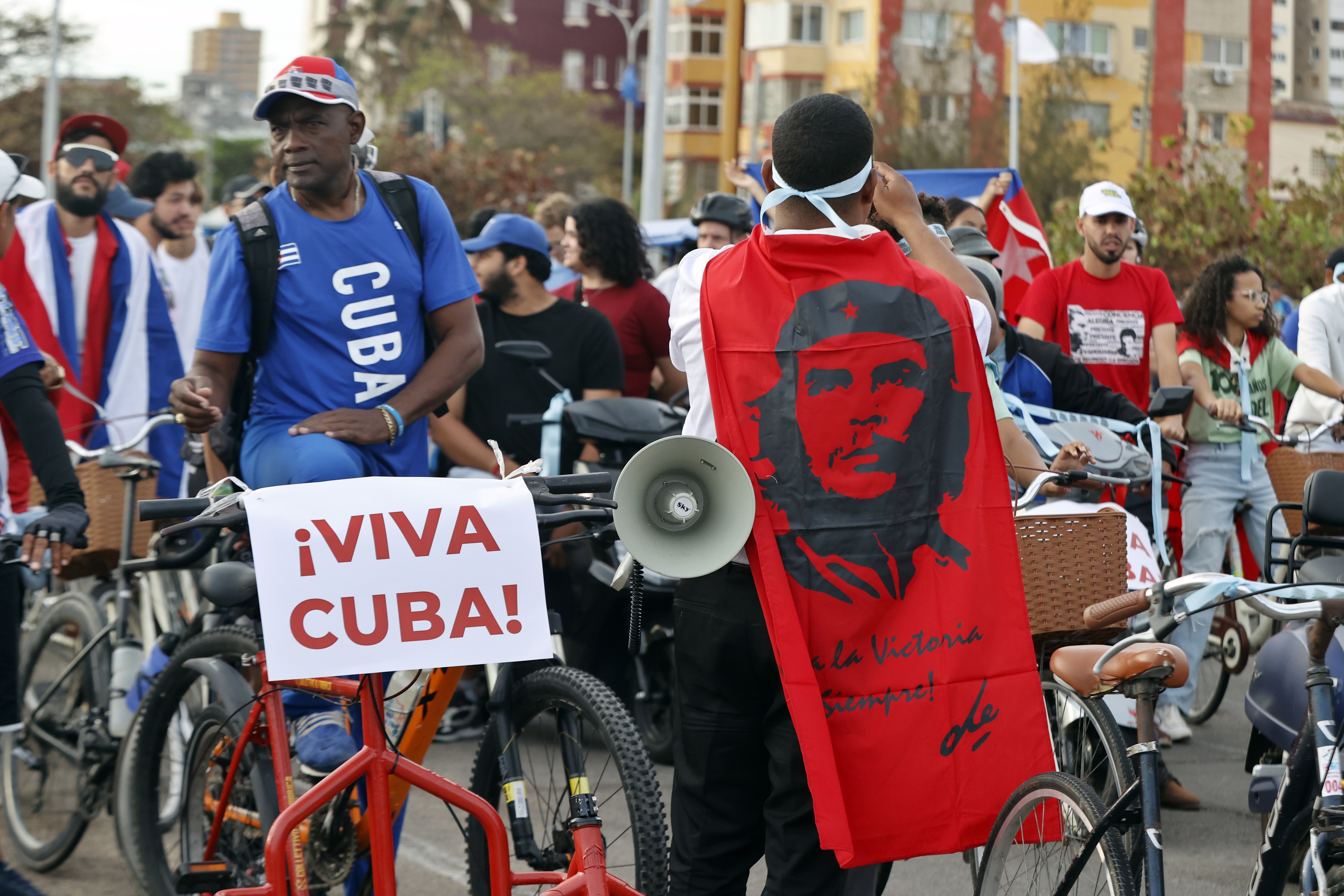 epa12866281 People prepare to ride their bicycles as part of the 'Youth Anti-Imperialist Parade on Wheels' along the Malecon in Havana, Cuba, 02 April 2026. The island continues to struggle with the impacts of a severe energy crisis amid the oil embargo imposed by the US government since January 2026. EPA/ERNESTO MASTRASCUSA