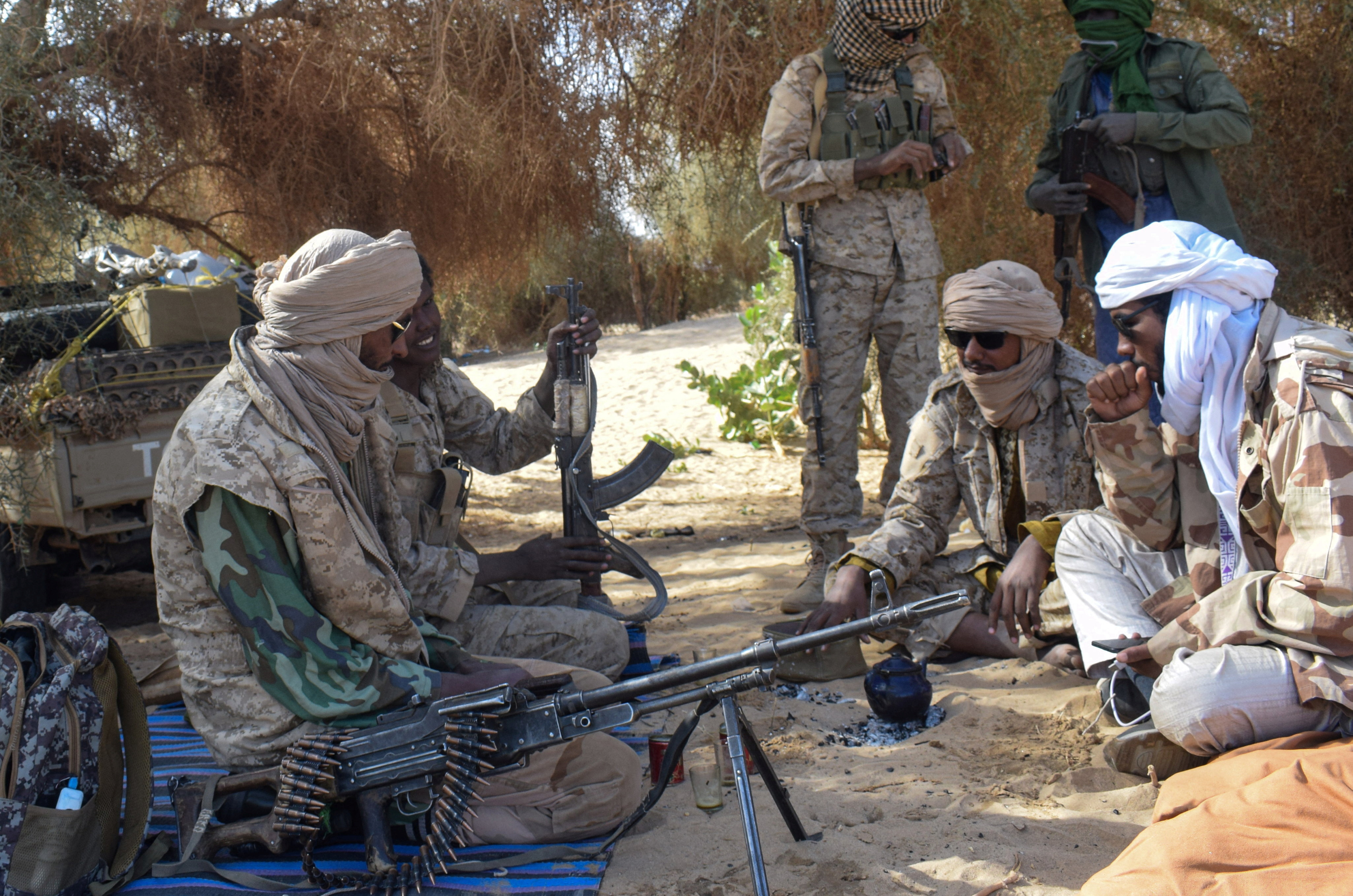 Fighters from Permanent Strategic Framework for the Defense of the People of Azawad (CSP-DPA) sit together