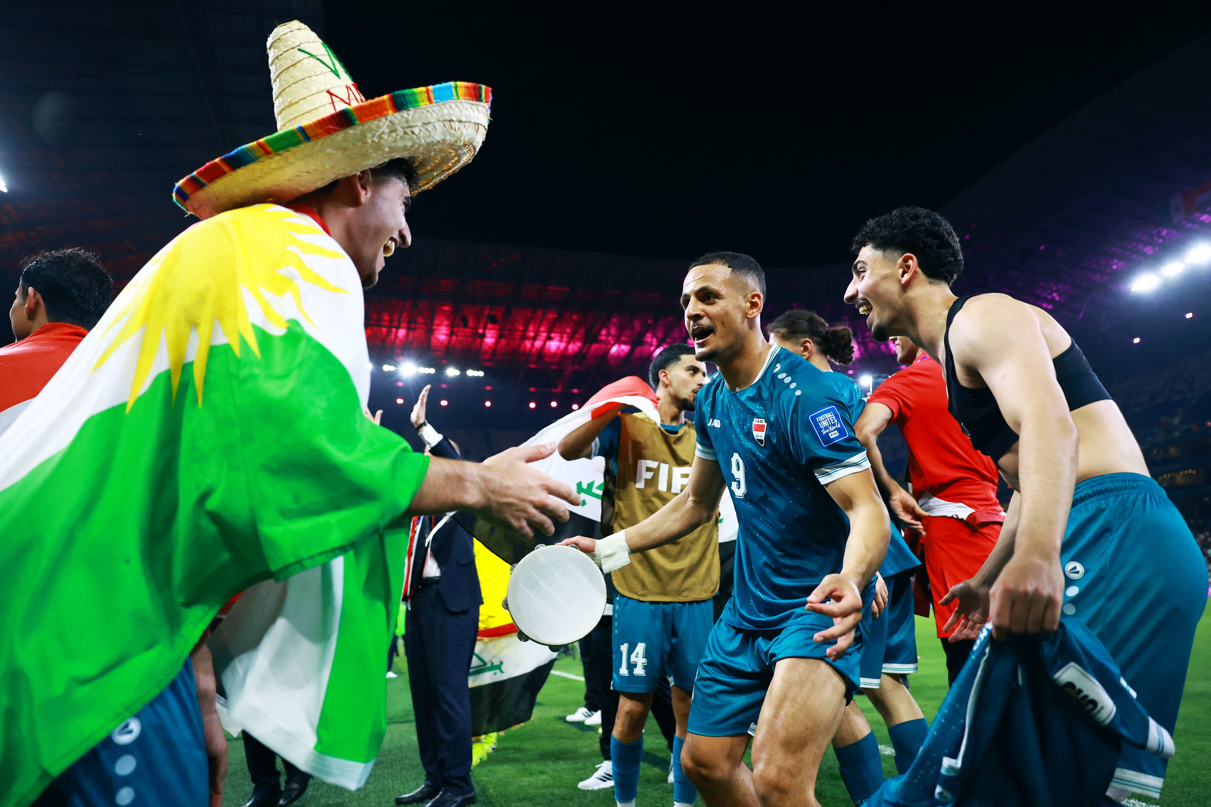 Soccer Football - FIFA World Cup - Inter-Confederation Playoffs - Final - Iraq v Bolivia - Estadio Monterrey, Monterrey, Mexico - March 31, 2026 Iraq's Ali Al-Hamadi celebrates with teammates after qualifying for FIFA World Cup REUTERS/Raquel Cunha