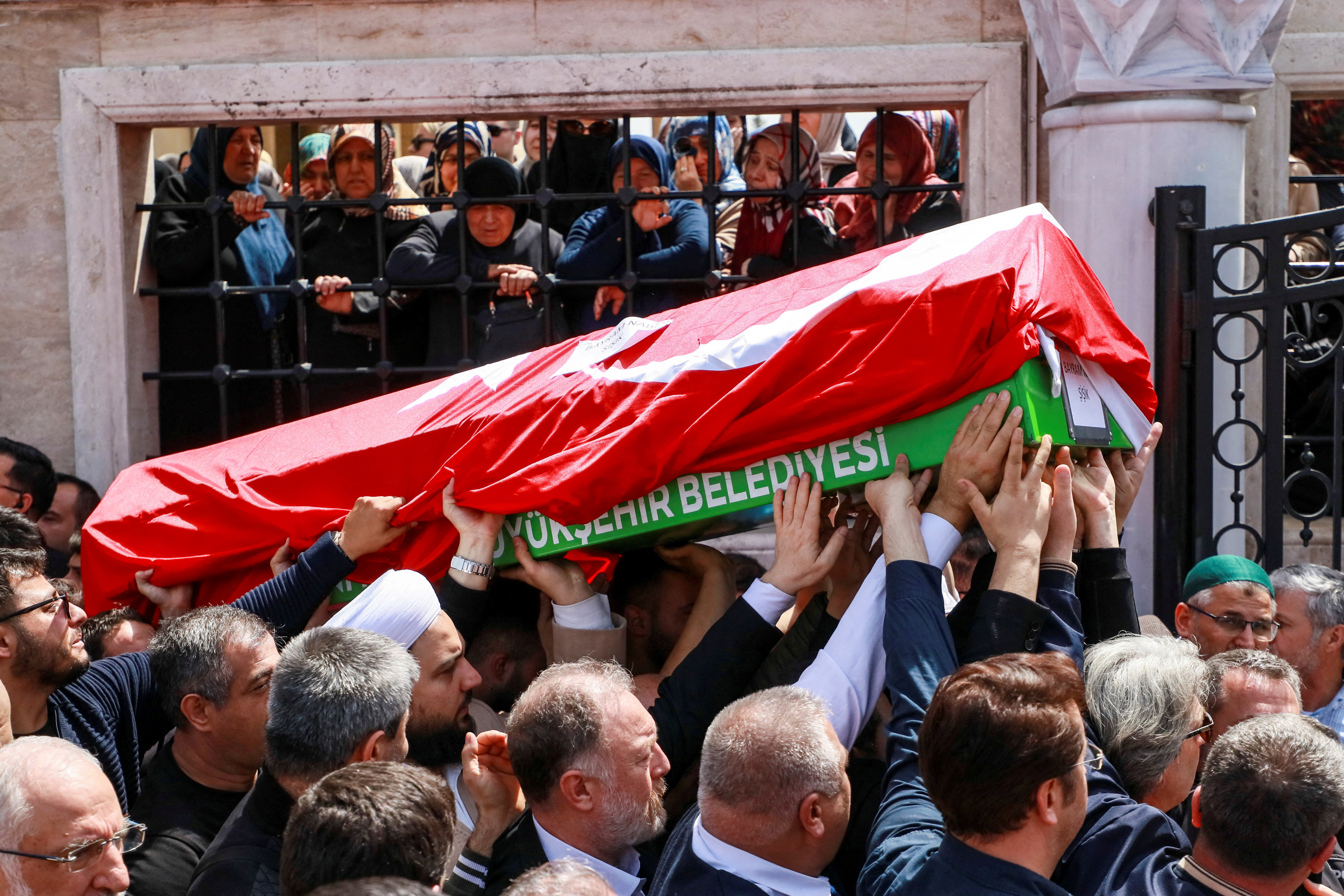 People carry the coffin of a victim of a school shooting during the funeral prayers at a mosque in Kahramanmaras, Turkiye, on April 16, 2026
