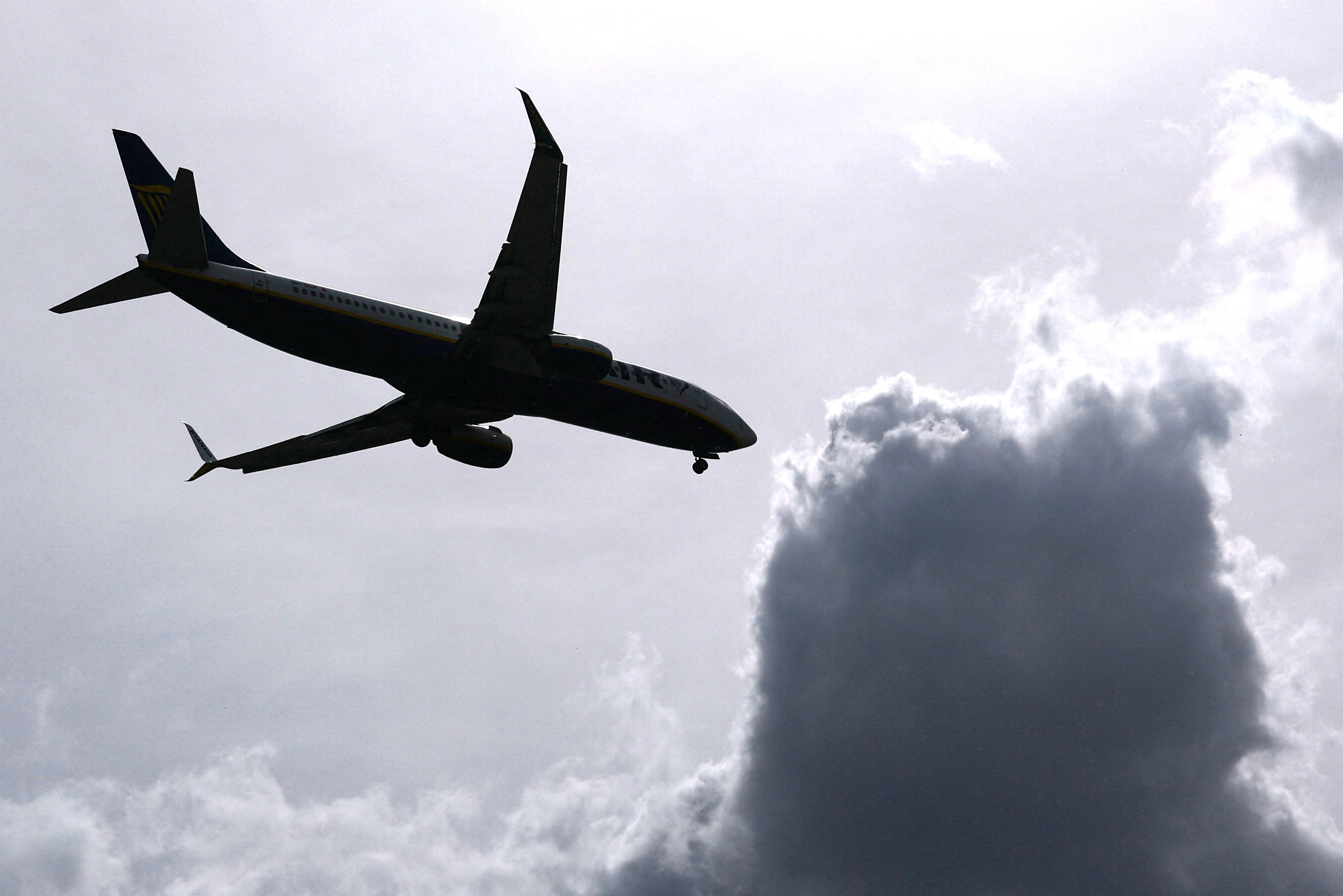 An airplane and some dark clouds