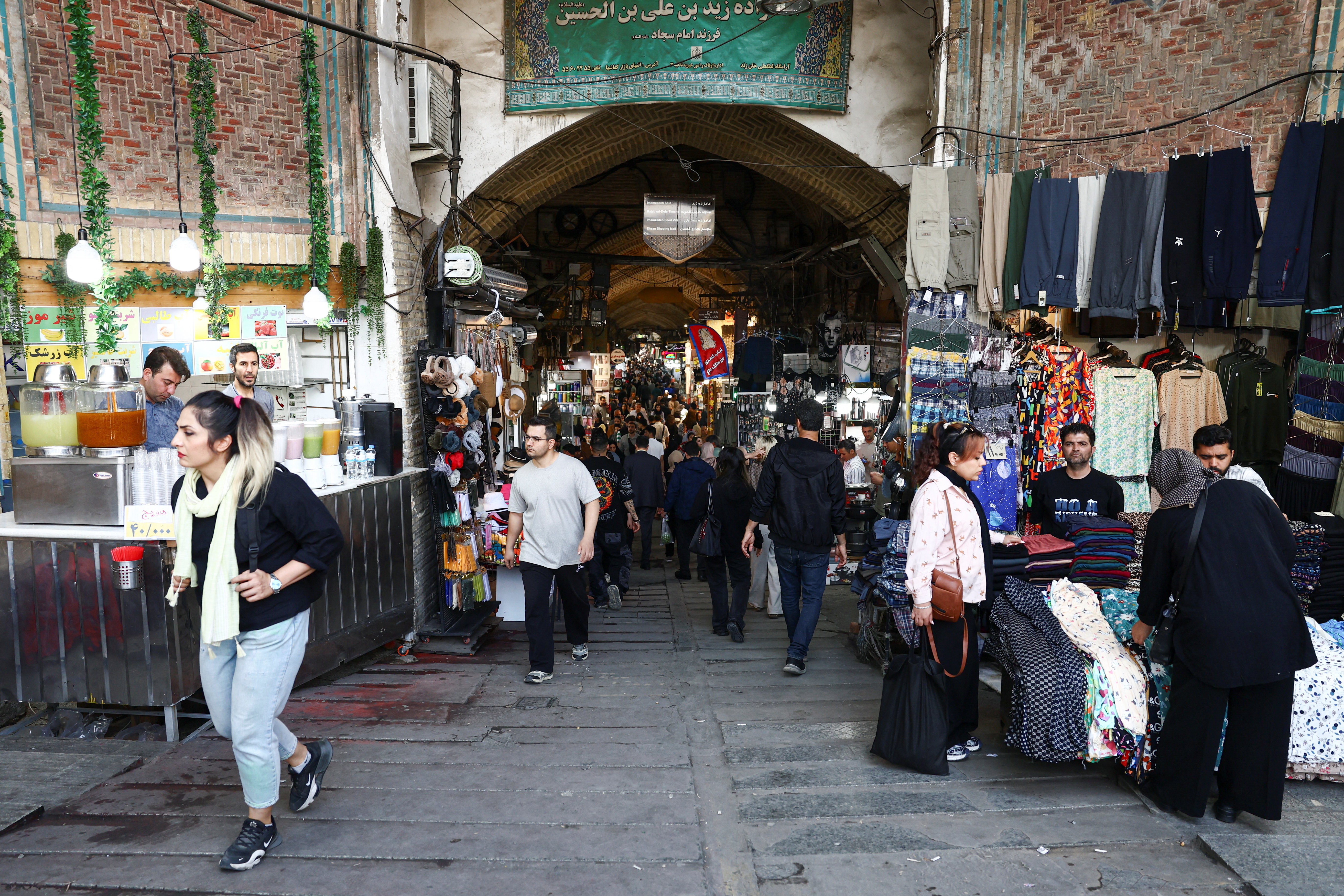 People walk in Tehran Bazaar, amid a ceasefire between U.S. and Iran, in Tehran, Iran, April 21, 2026. Majid Asgaripour/WANA (West Asia News Agency) via REUTERS ATTENTION EDITORS - THIS PICTURE WAS PROVIDED BY A THIRD PARTY