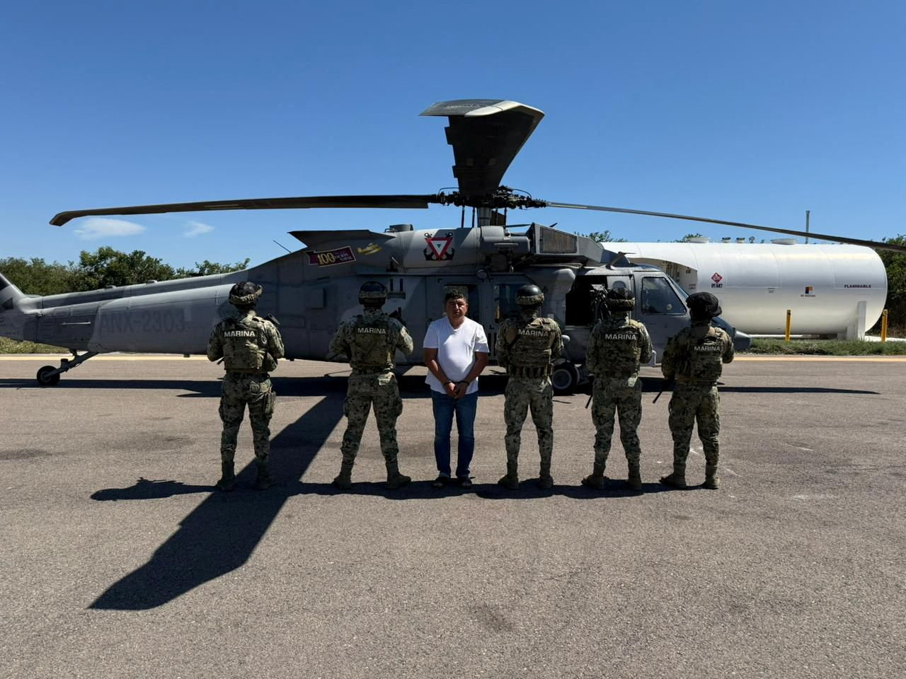 Members of Mexican Special Forces escort Audias Flores, known as “El Jardinero” a top commander of the powerful Jalisco New Generation Cartel, in the western state of Nayarit, Mexico, in this handout distributed on April 27, 2026. Secretaria de Marina (SEMAR)/Handout via REUTERS ATTENTION EDITORS - THIS IMAGE HAS BEEN SUPPLIED BY A THIRD PARTY. NO RESALES. NO ARCHIVES. TPX IMAGES OF THE DAY