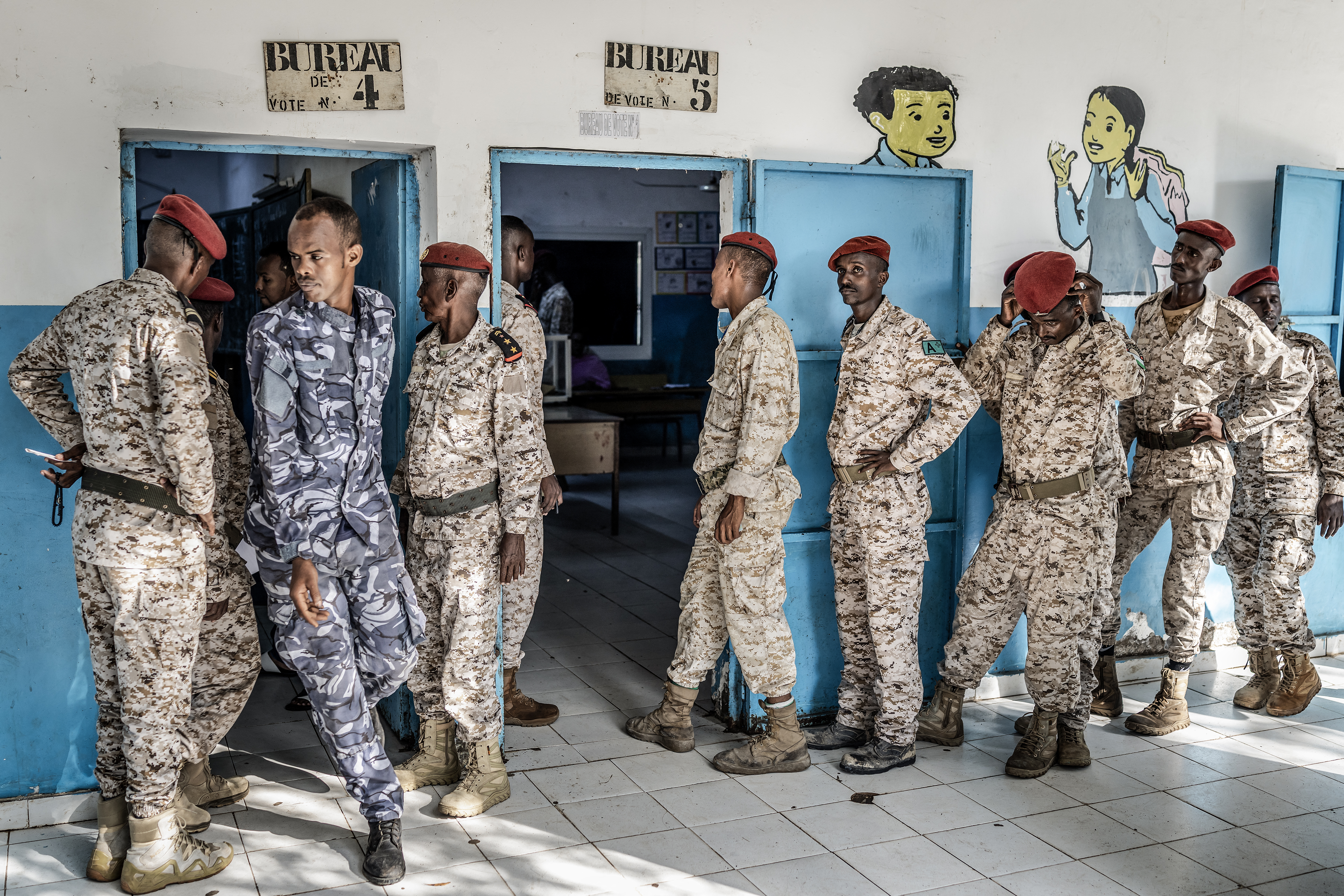 Soldiers queue to cast their votes on April 10