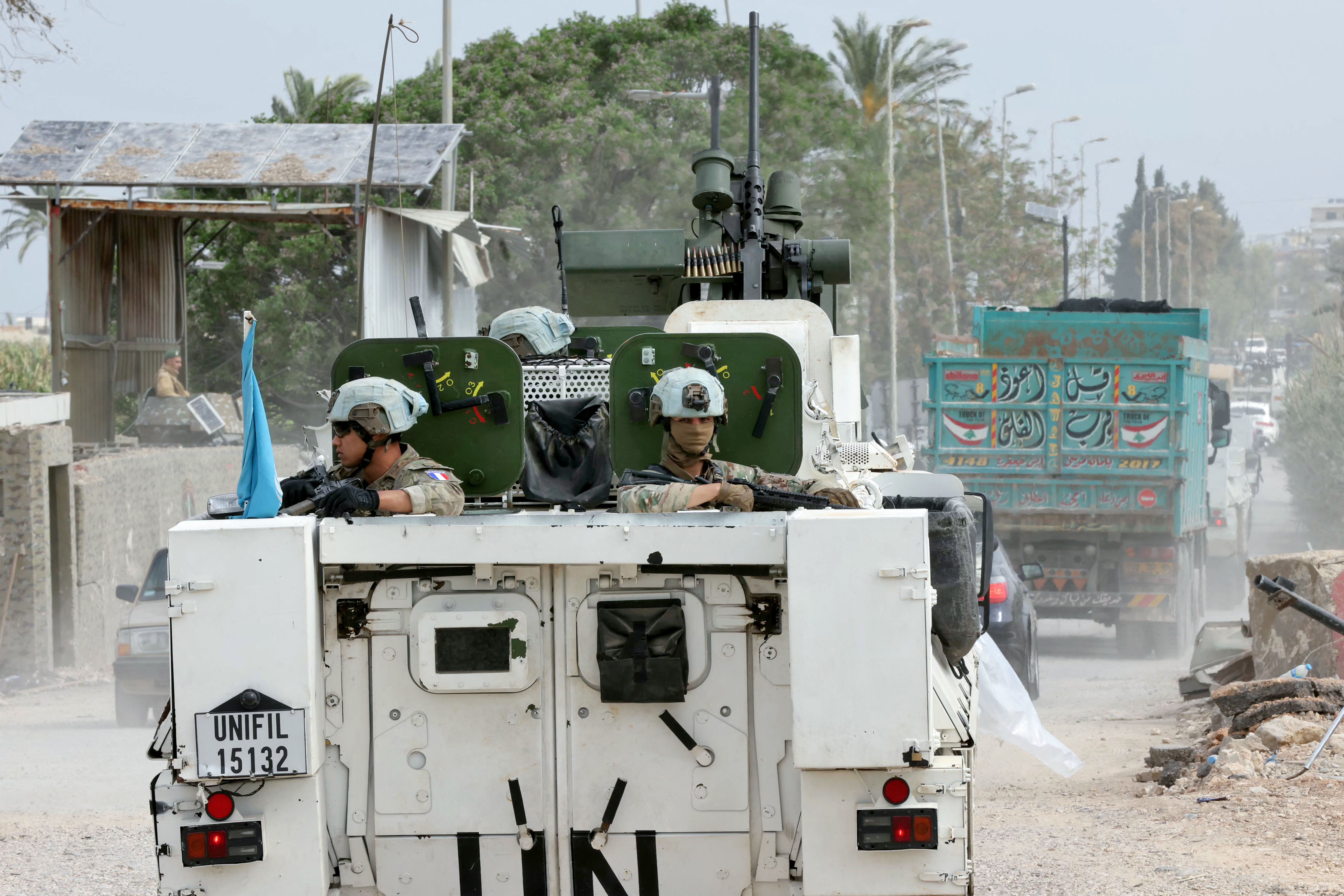 French contingent vehicles serving with the United Nations Interim Force in Lebanon (UNIFIL) cross the Qasmiyeh Bridge heading toward Sidon and Beirut, on April 19, 2026. Hezbollah on April 18 denied it was involved in a deadly attack on United Nations peacekeepers (UNIFIL) in southern Lebanon, after France accused the group of being behind the incident. Israel and Lebanon agreed to a 10-day ceasefire on April 16 in order to negotiate an end to six weeks of war between Israel and the Iran-backed group Hezbollah. The conflict saw massive Israeli airstrikes across Lebanon and also a ground invasion in the south. (Photo by MAHMOUD ZAYYAT / AFP)