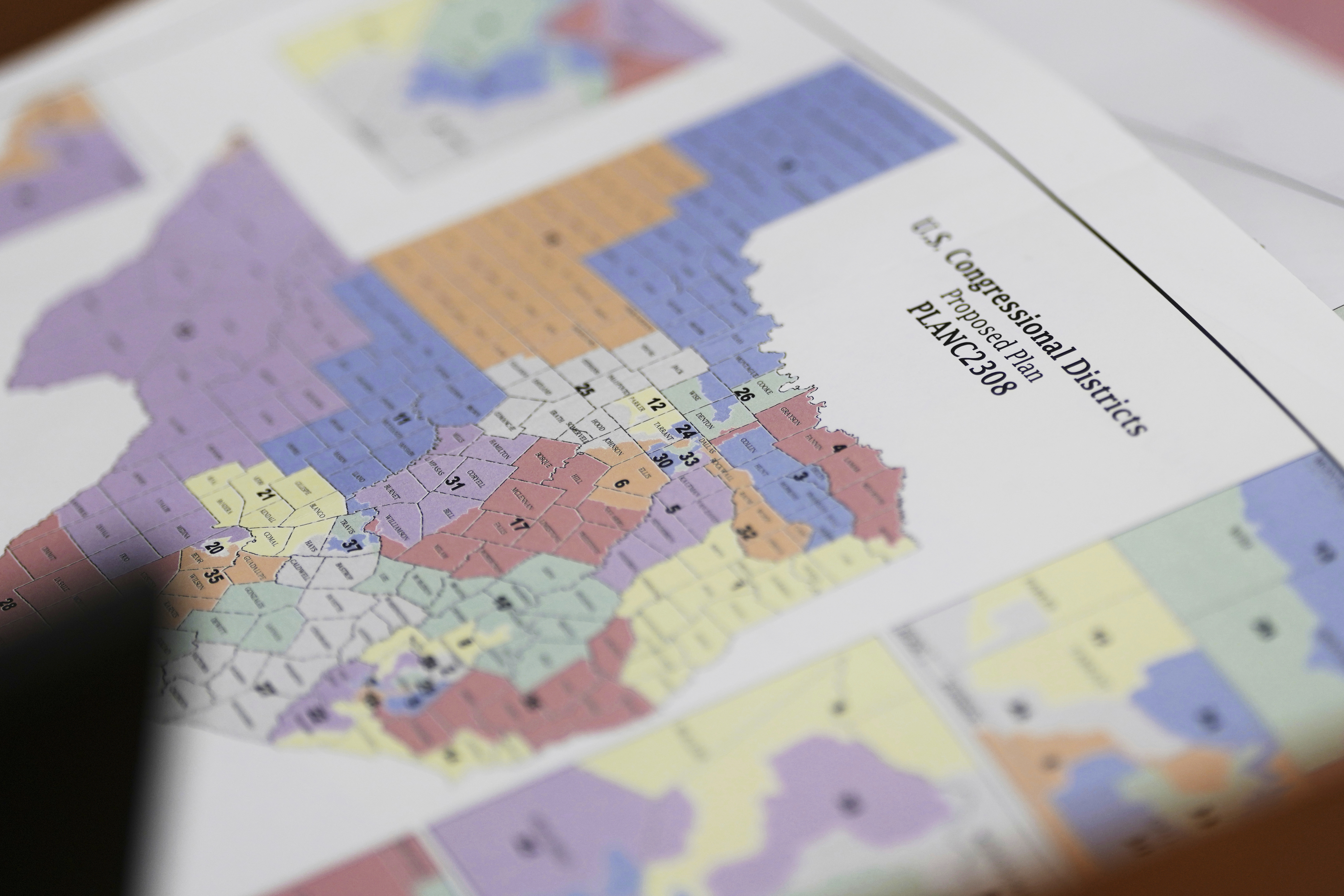 A map of U.S Congressional Districts proposed plan is seen at a Texas legislators' public hearing on congressional redistricting in Austin