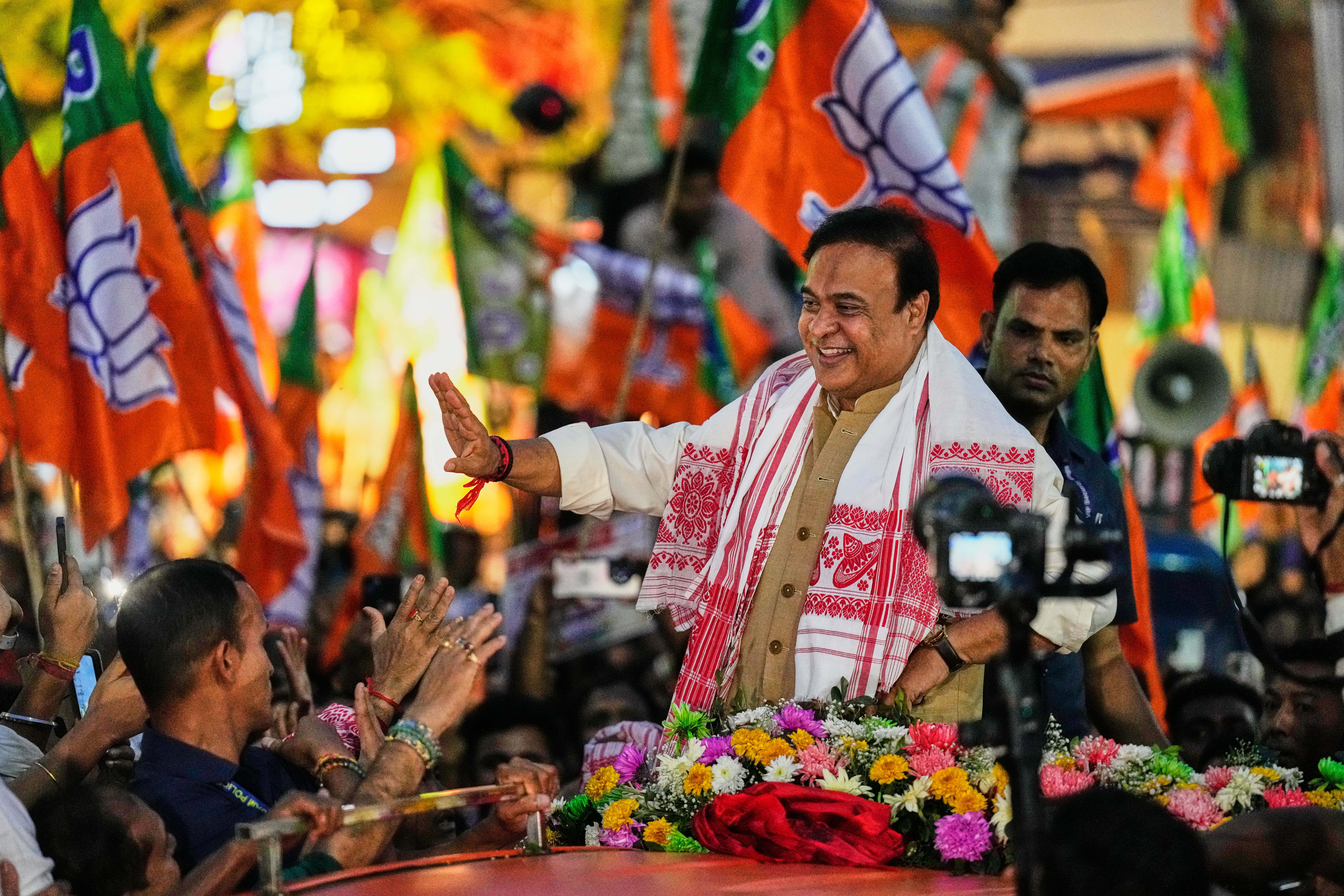 Assam chief minister Himanta Biswa Sarma, candidate of Bharatiya Janta Party (BJP) attends an election campaign rally ahead of state assembly election in Guwahati, India, Monday, March 23, 2026. (AP Photo/Anupam Nath)