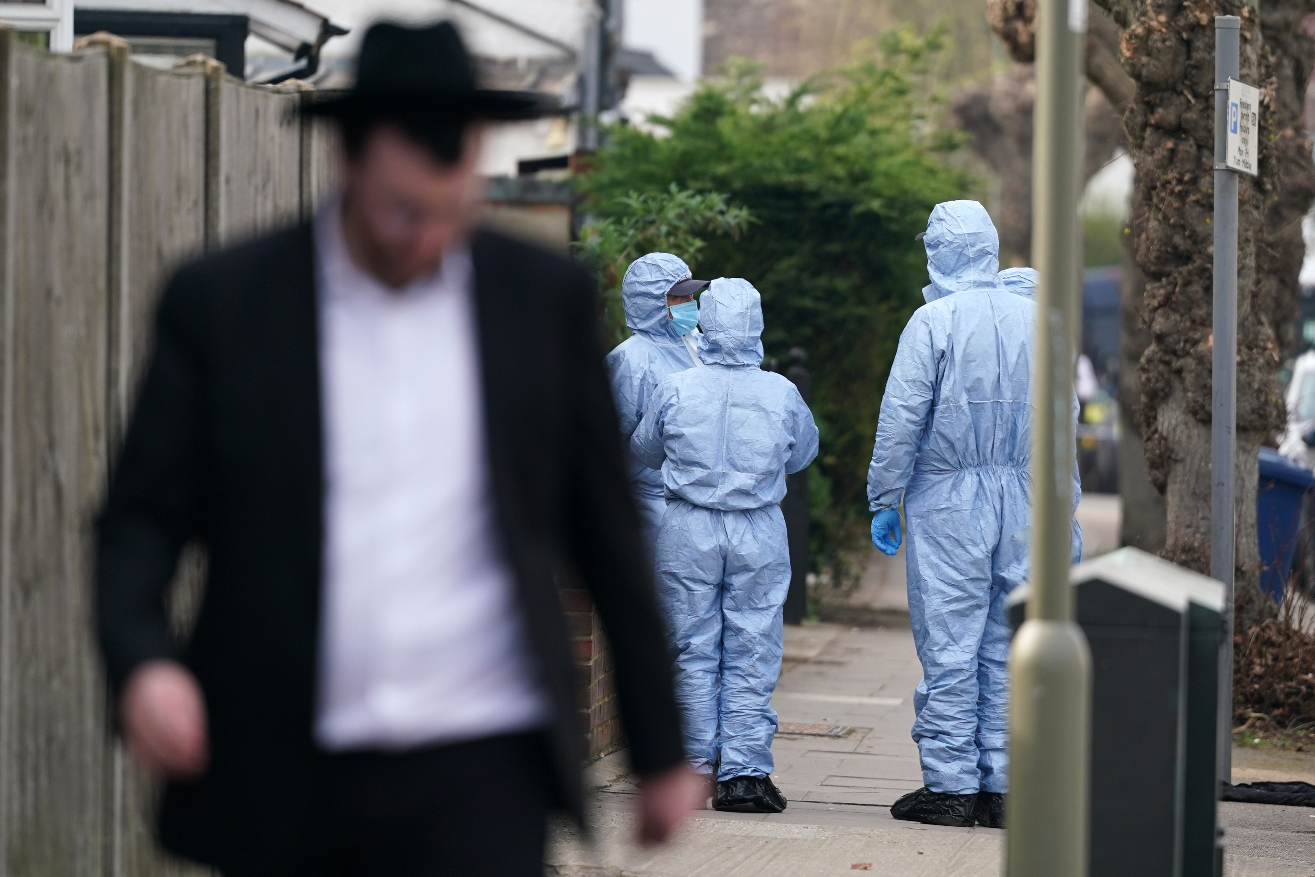 Forensic experts get ready to investigate a section of Golders Green, London after an arson attack on four vehicles belonging to a Jewish ambulance service, Hatzola Northwest, on March 23, 2026