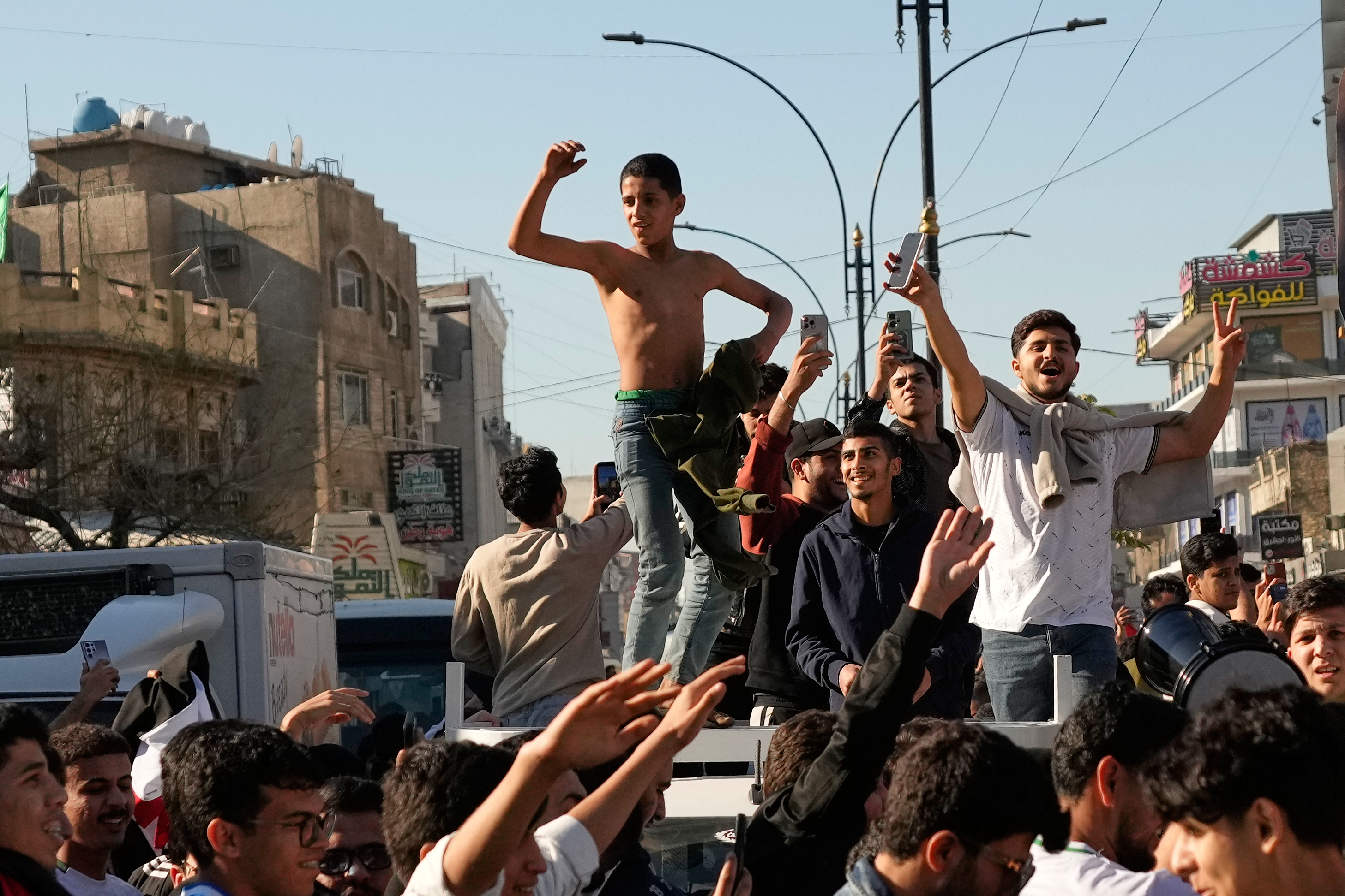 Iraqis celebrate on the streets