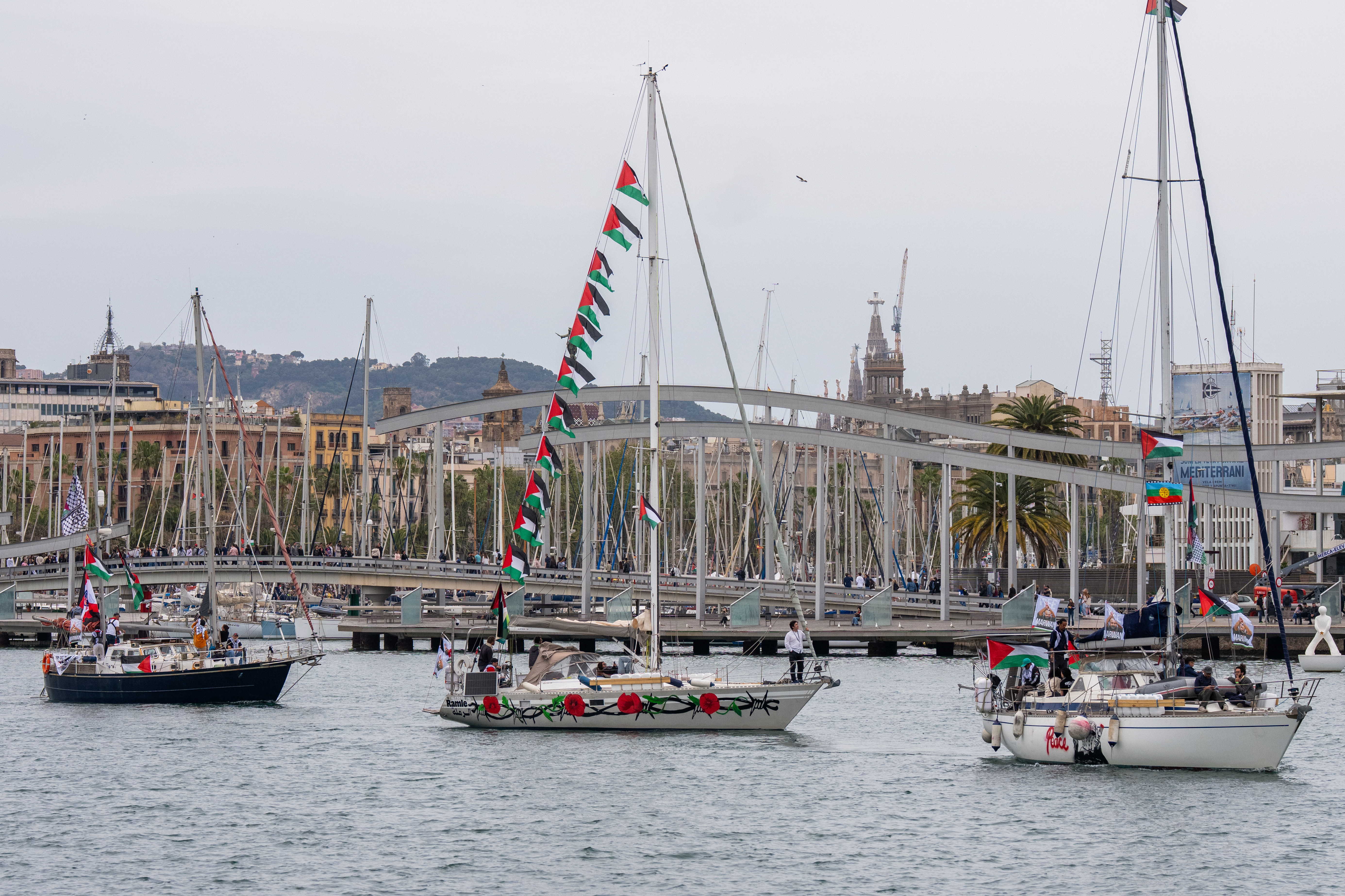 Boats carrying activists and humanitarian aid for Palestinians in Gaza reposition in the port during a symbolic send-off as part of the Global Sumud Flotilla in Barcelona, Spain on April 12, 2026.