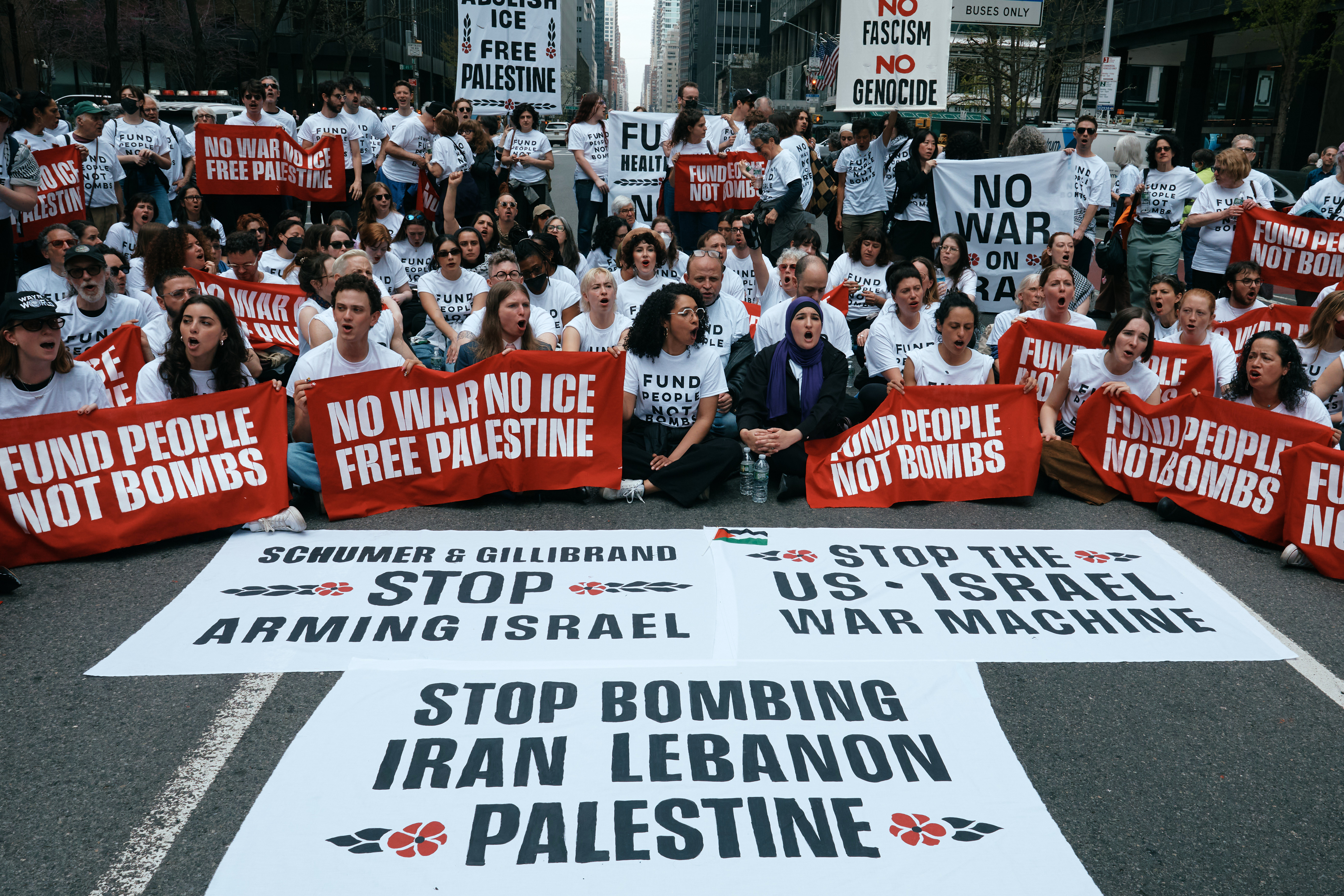 Protesters with Jewish Voice for Peace block traffic during a demonstration outside the New York office of U.S. Sen. Chuck Schumer, calling for an end to the U.S.-Israel war with Iran and opposing U.S. weapons support, Monday, April 13, 2026, in New York.