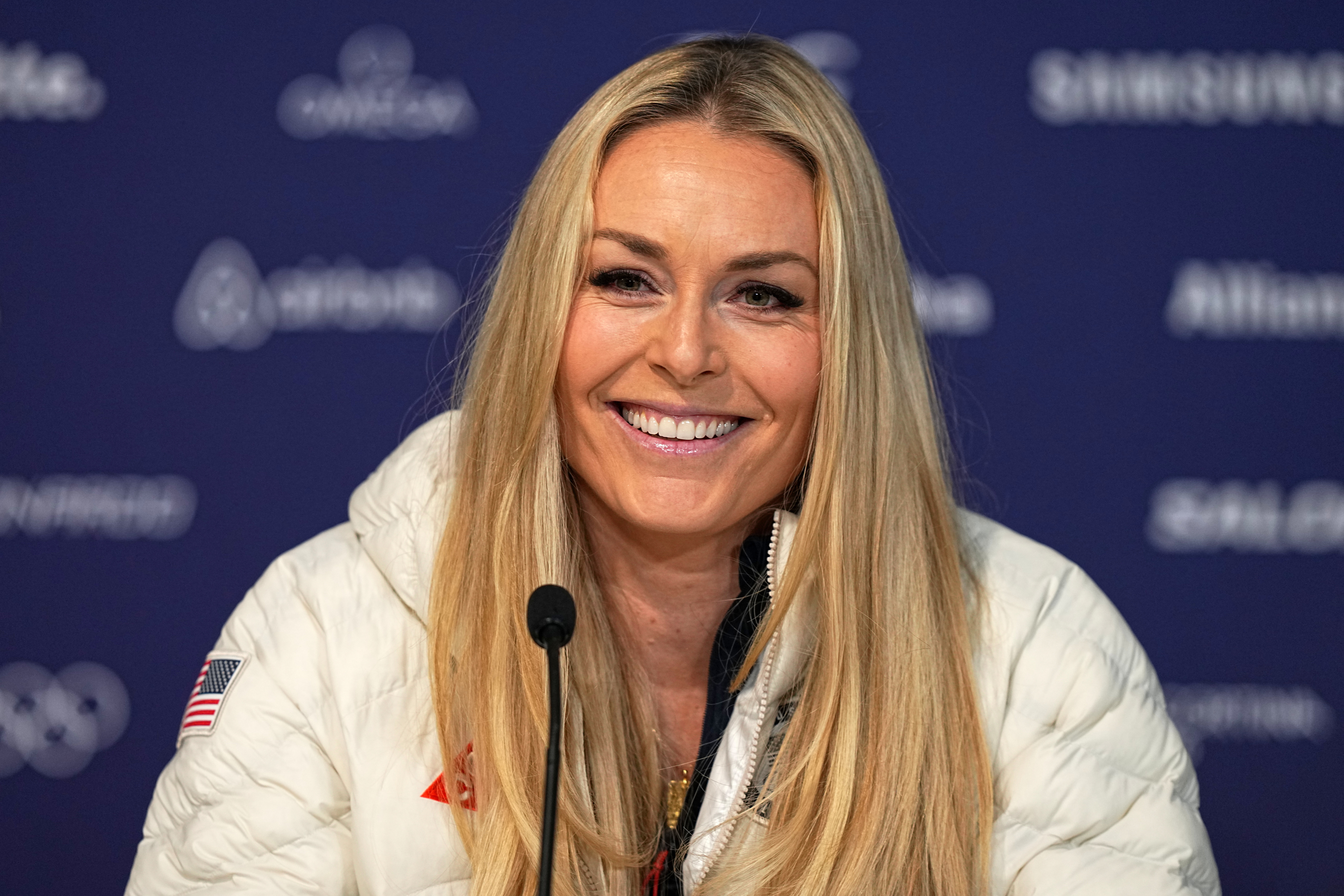 United States' Lindsey Vonn smiles during a press conference by the U.S. ski team at the 2026 Winter Olympics