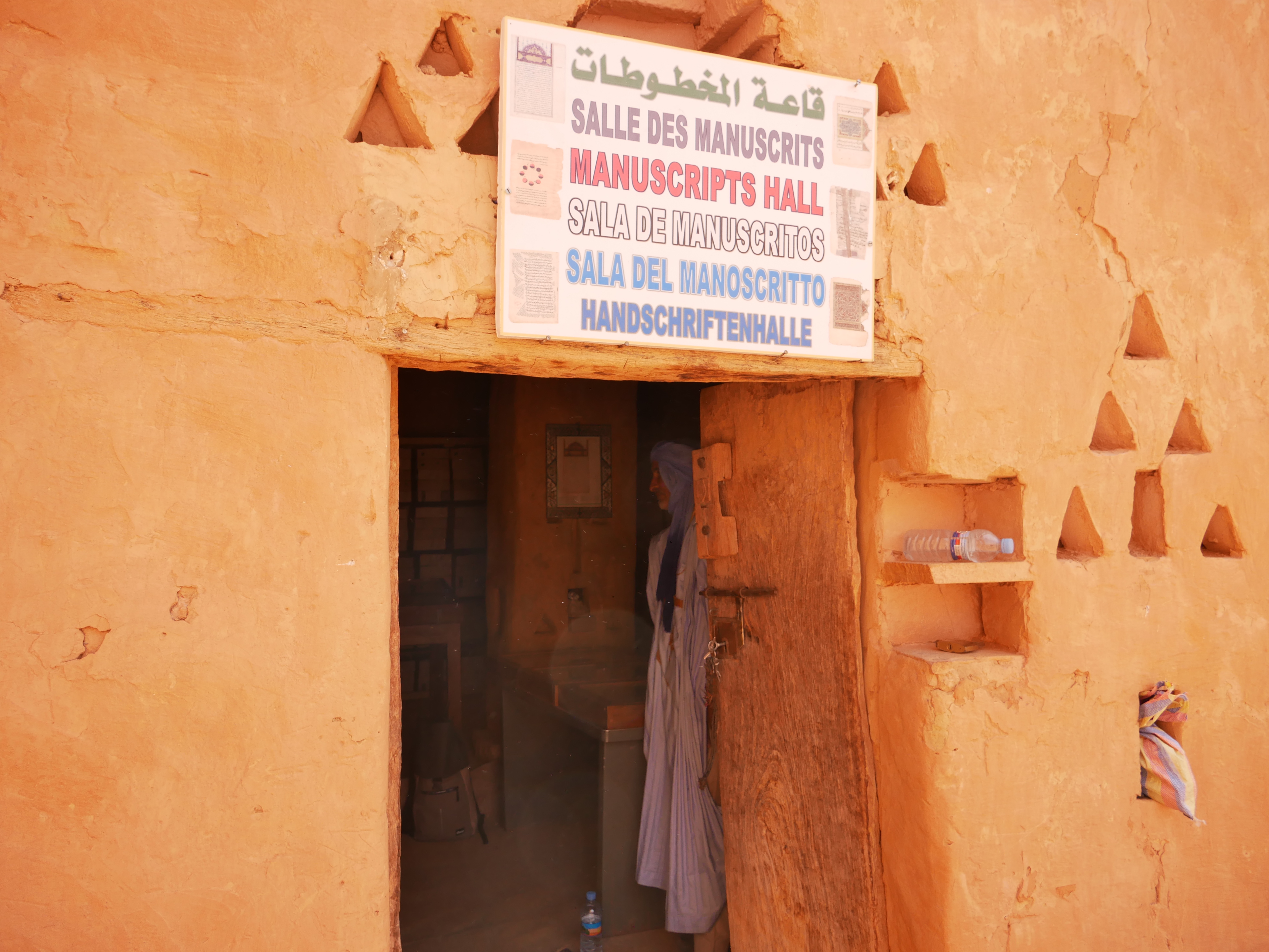 Bookkeeper el-Habot stands inside the family library on a recent weekday [Shola Lawal]