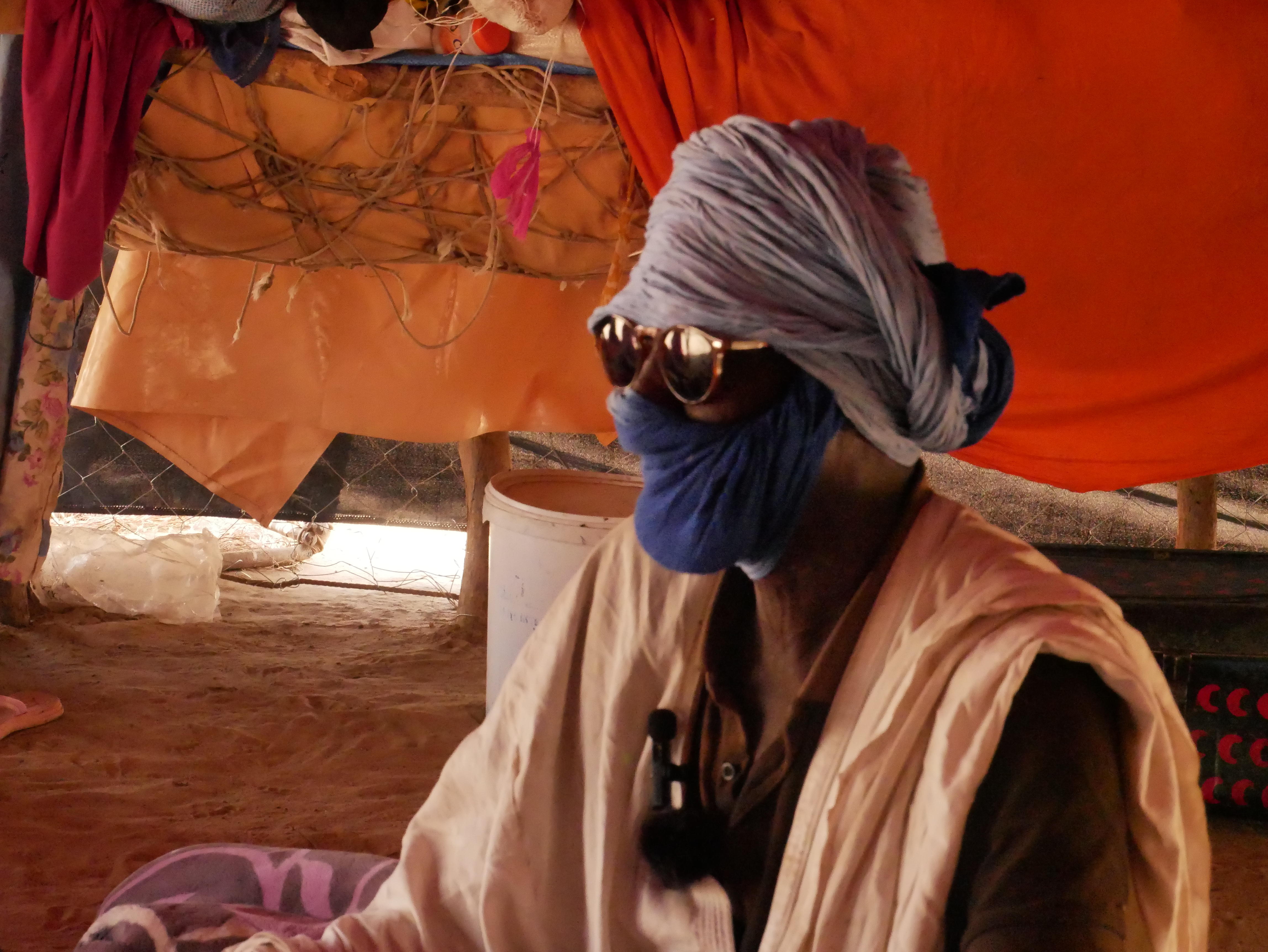 A Malian refugee now willing to the identified sits in his tent in Dounkara village, Mauritania [Shola Lawal/Al Jazeera]