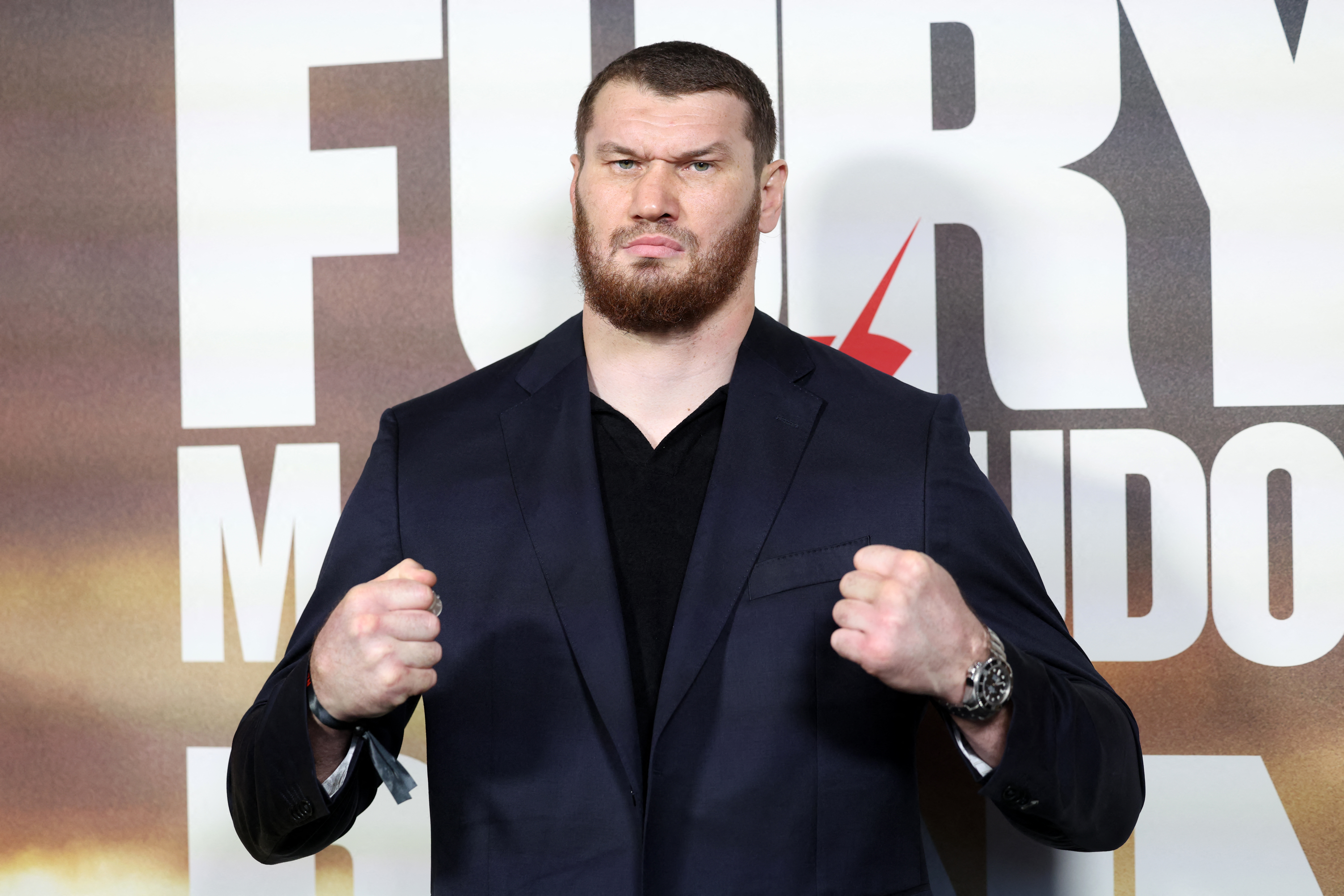 Russia's Arslanbek Makhmudov arrives on the red carpet to attend a "Grand Arrival" event in central London on April 8, 2026, ahead of the heavyweight boxing match with Britain's two-time former world heavyweight champion Tyson Fury and on April 11.