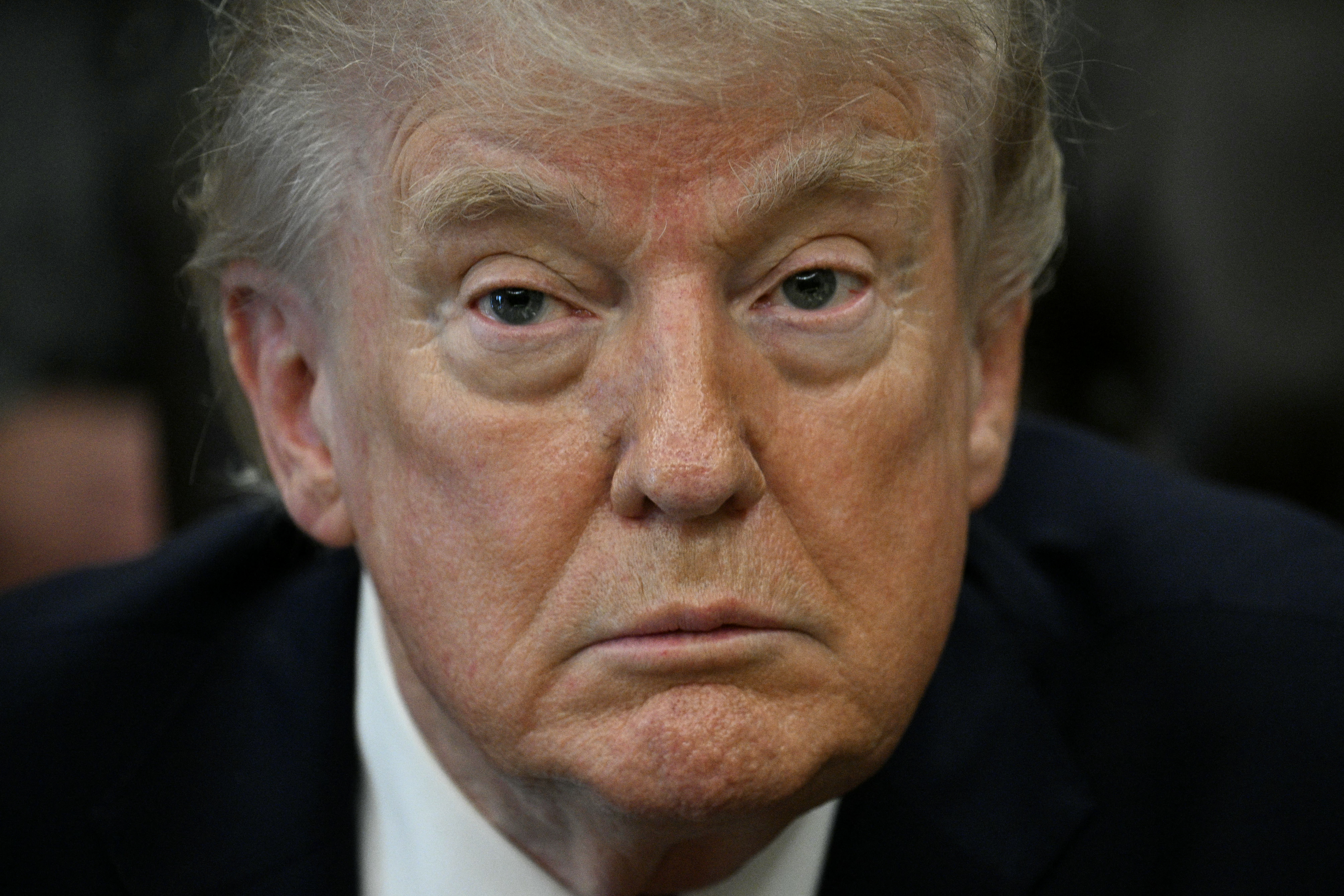 US President Donald Trump speaks after signing an executive order in the Oval Office of the White House in Washington, DC on April 18, 2026.
