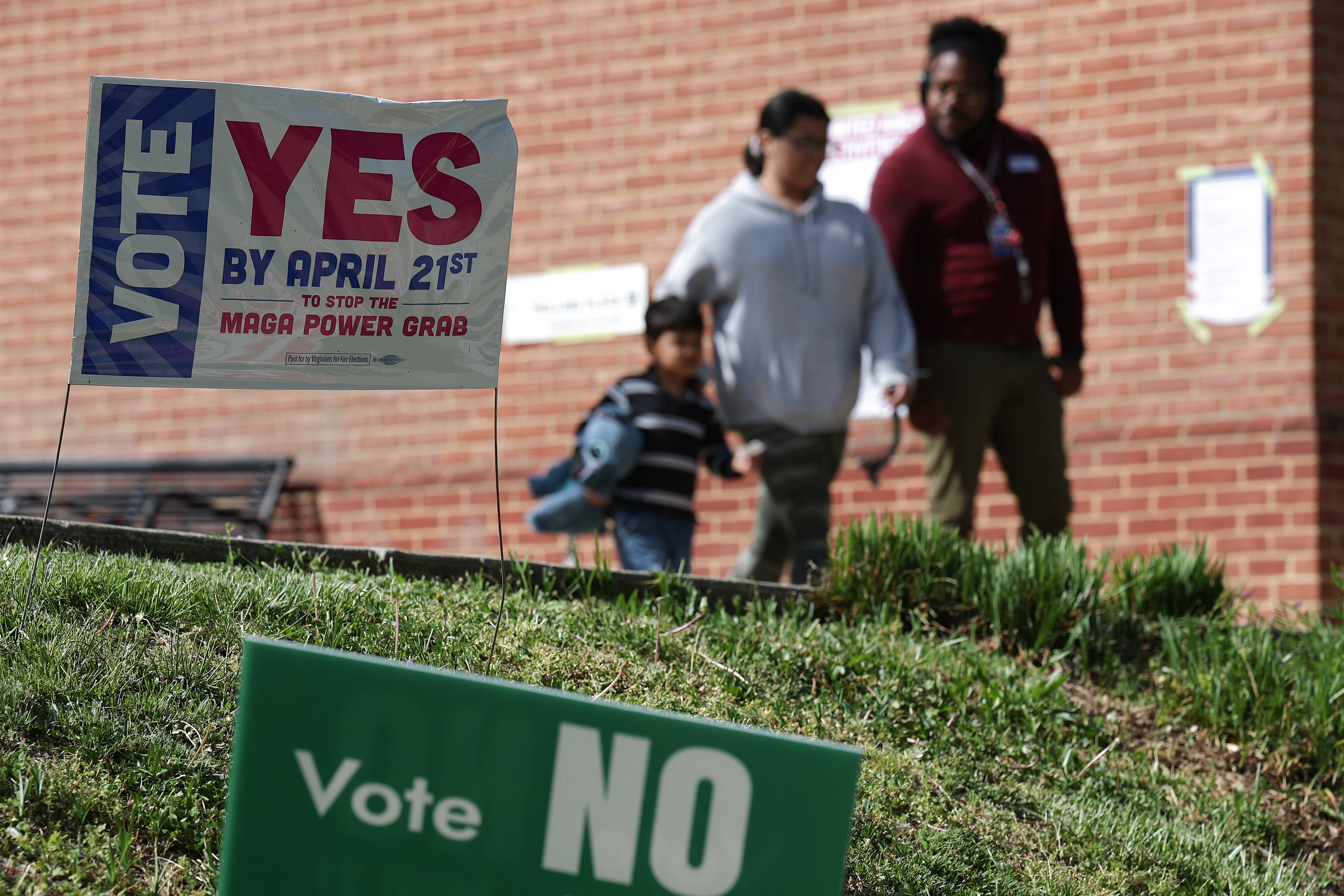 ARLINGTON, VIRGINIA - APRIL 21: Voters depart after casting their ballots at a polling location at the Westover Library on April 21, 2026 in Arlington, Virginia. Virginia voters will decide today on a statewide ballot question on whether to allow the Virginia General Assembly to redraw congressional districts which could affect how the state’s U.S. House districts are mapped in upcoming elections and shift political balance. Win McNamee/Getty Images/AFP (Photo by WIN MCNAMEE / GETTY IMAGES NORTH AMERICA / Getty Images via AFP)