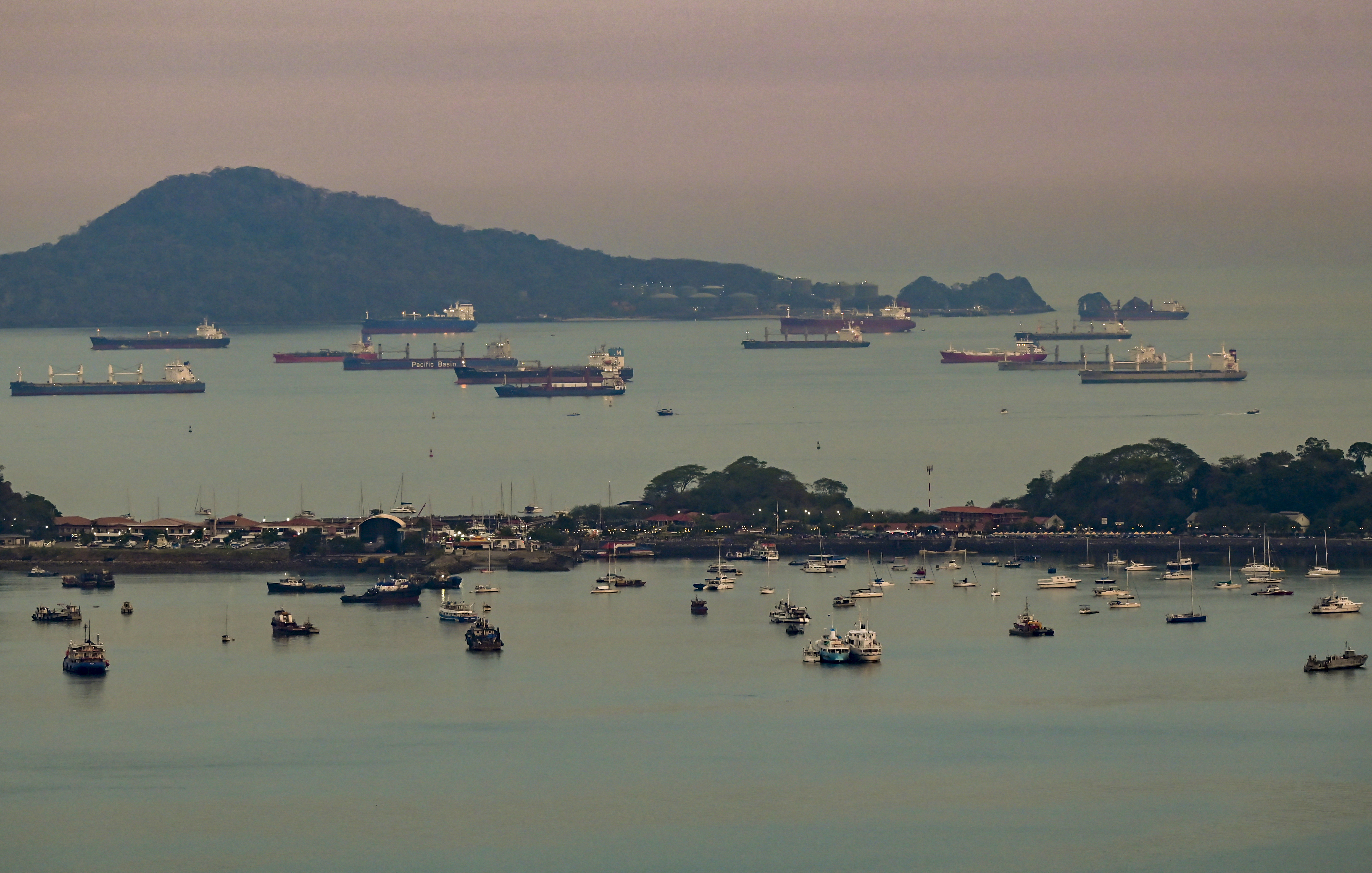 Cargo ships wait to transit the Panama Canal in Panama City on April 26, 2026.