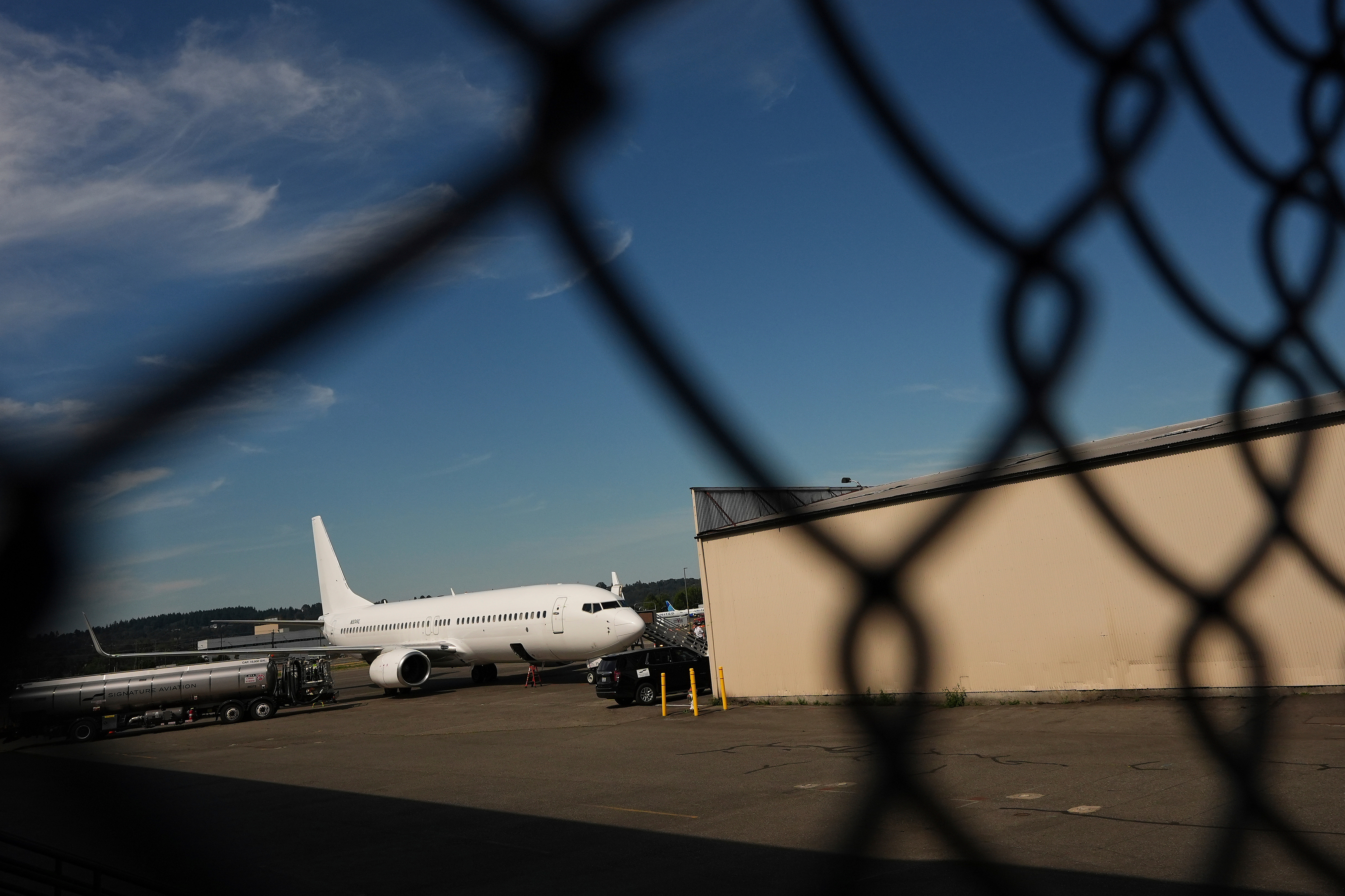 FILE - A U.S. Immigration and Customs Enforcement flight operates out of King County International Airport-Boeing Field, Aug. 23, 2025, in Seattle. (AP Photo/Lindsey Wasson, File)