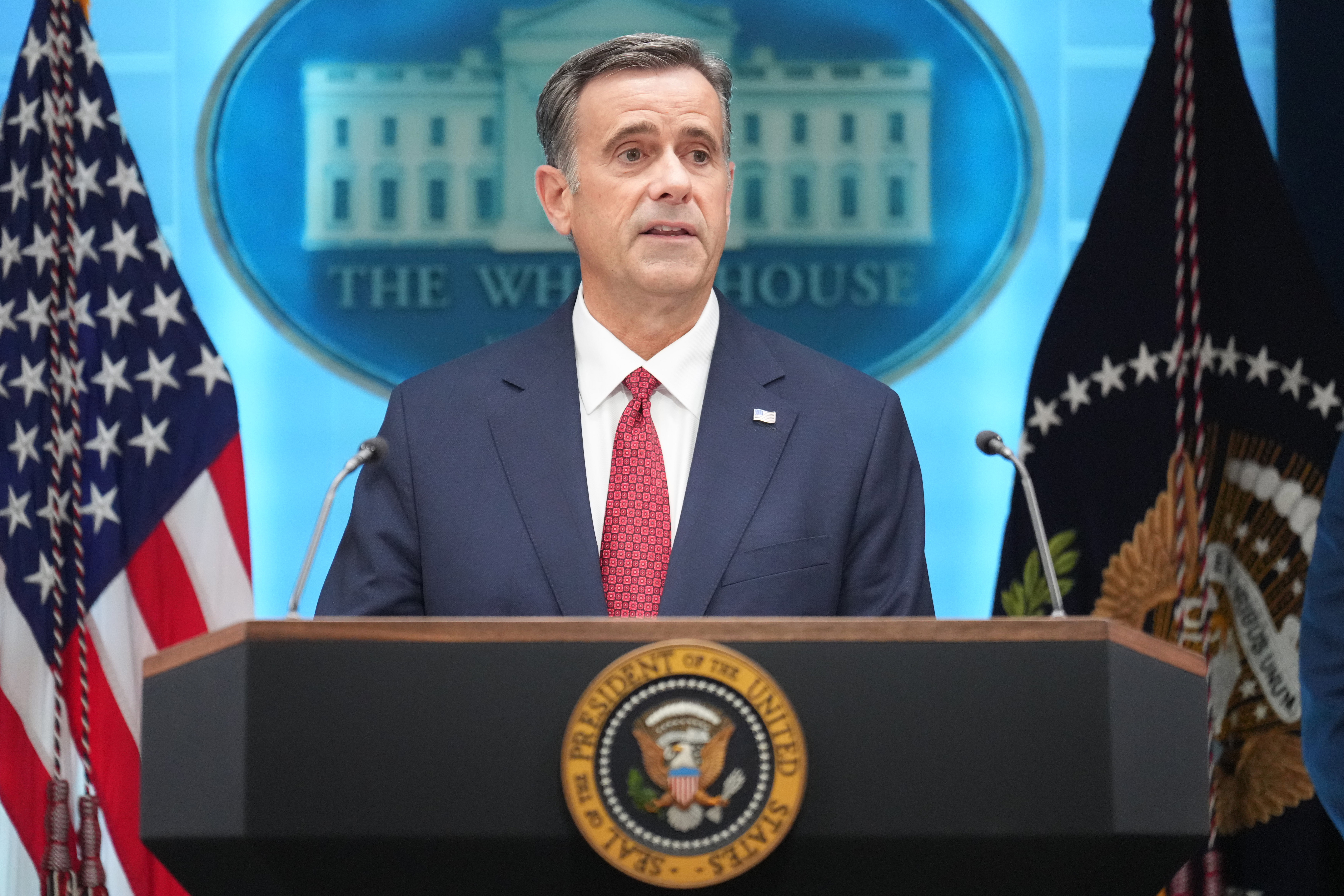 CIA Director John Ratcliffe speaks with reporters during a news conference with President Donald Trump in the James Brady Press Briefing Room at the White House, Monday, April 6, 2026, in Washington. (AP Photo/Mark Schiefelbein)