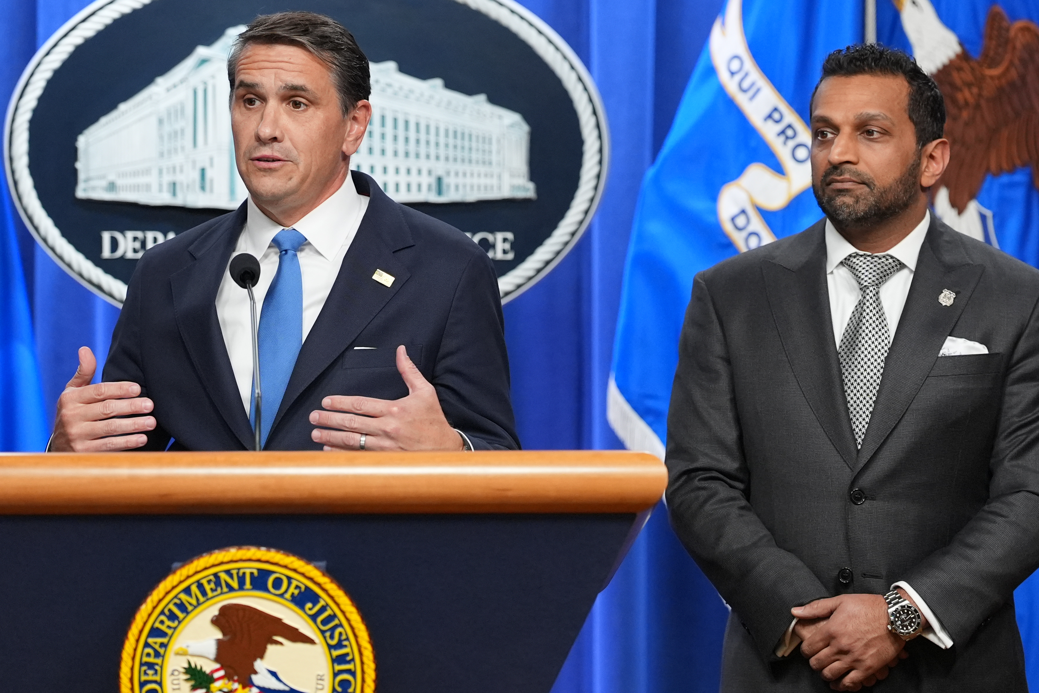 Acting Attorney General Todd Blanche speaks as FBI Director Kash Patel listens during a news conference at the Justice Department, Tuesday, April 21, 2026, in Washington. (AP Photo/Jacquelyn Martin)